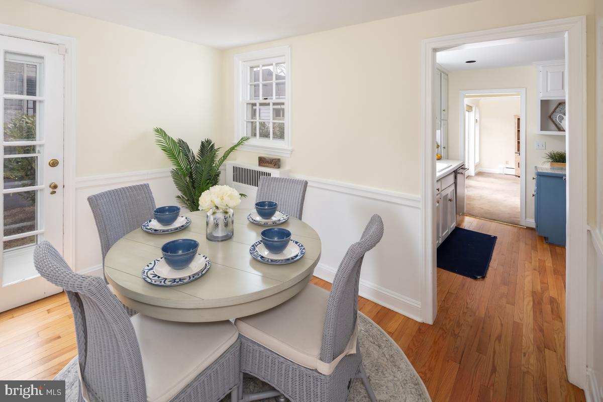 567 Manor Road Wynnewood, PA 19096 - Photo 10 of 34 a view of a dining room with furniture and wooden floor