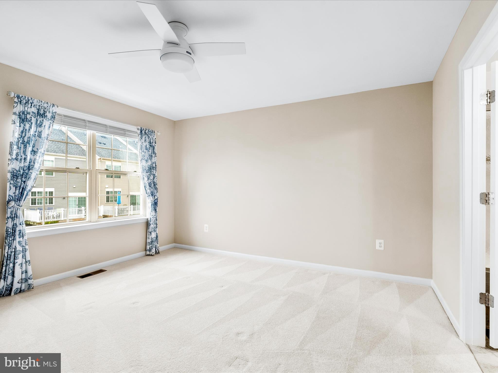 8479 Randell Ridge Road Frederick, MD 21704 - Photo 22 of 48 a view of an empty room with a window