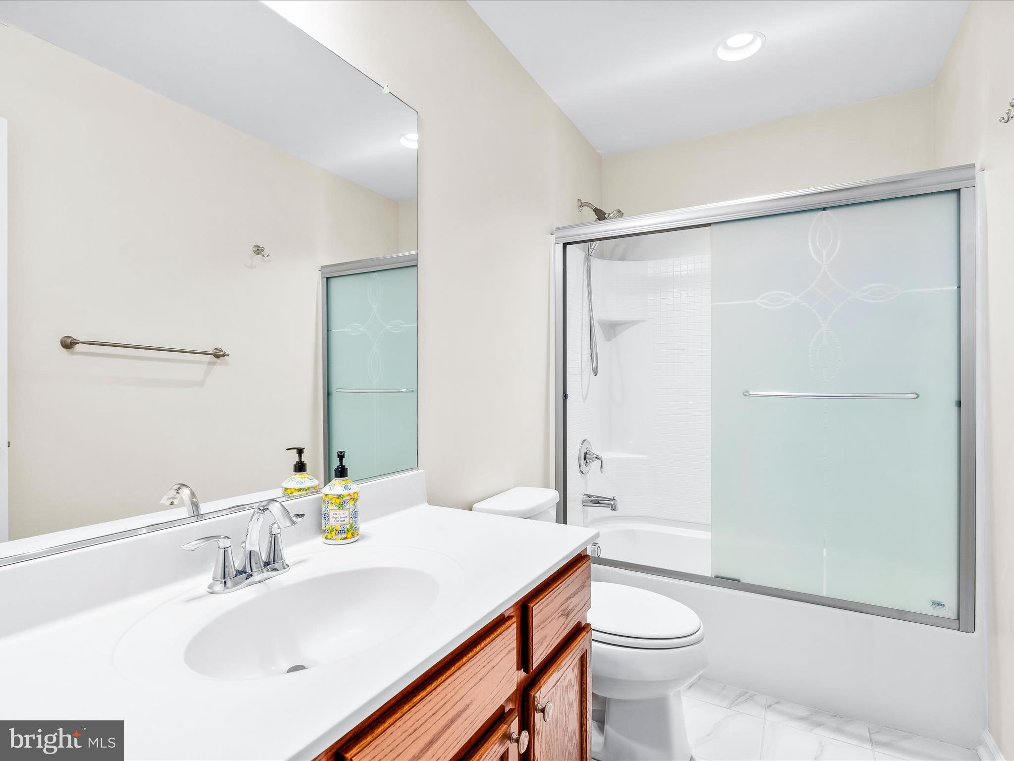 8479 Randell Ridge Road Frederick, MD 21704 - Photo 30 of 48 a bathroom with a sink a toilet and shower