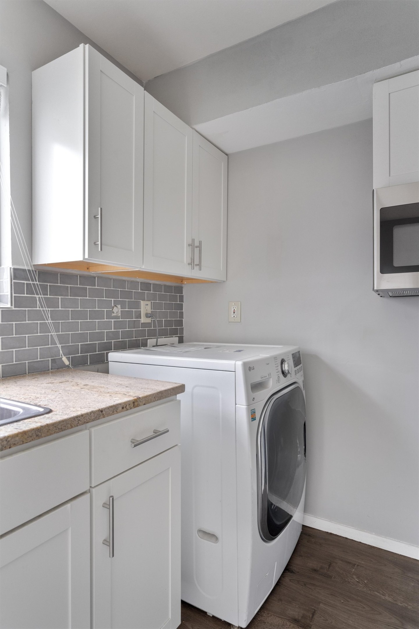 3415 Menchaca Road, Unit 113 Austin, TX 78704 - Photo 8 of 21 a utility room with sink dryer and washer