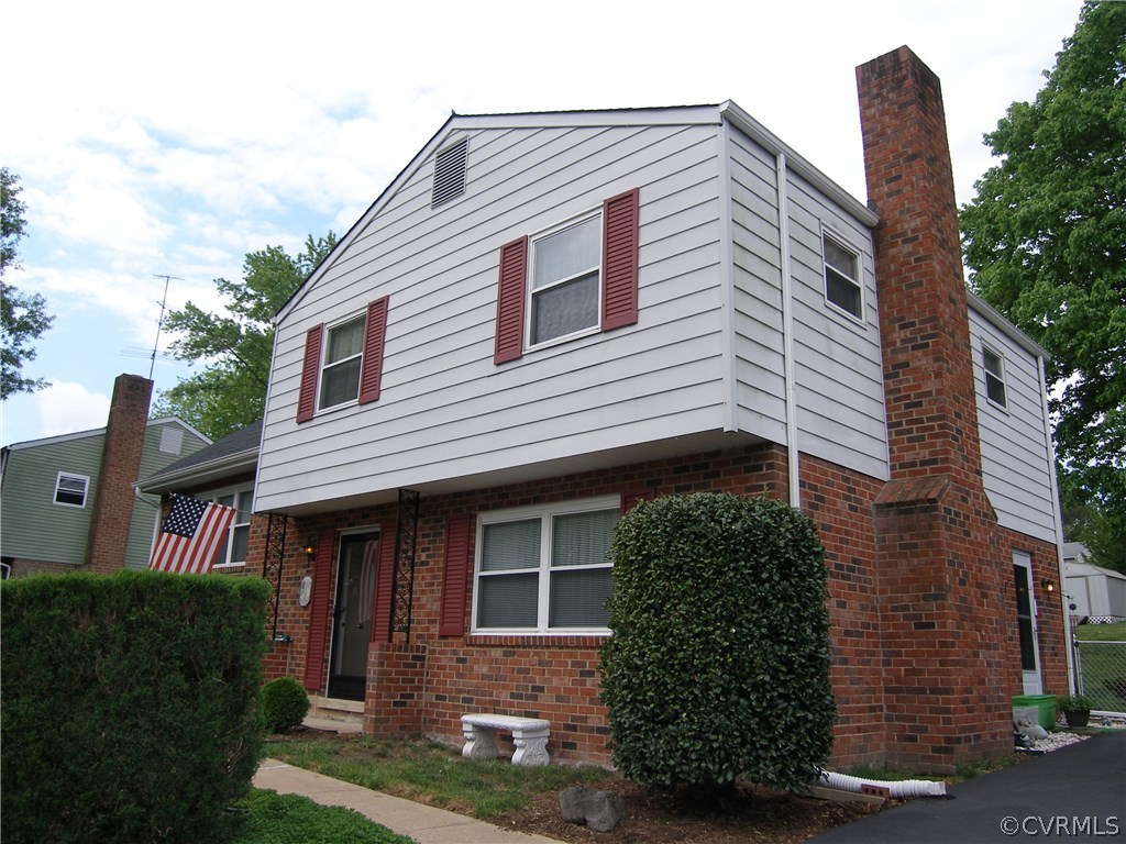 800 Whiffletree Road North Chesterfield, VA 23236 - Photo 9 of 47 Concrete Front Walkway, Paved Drive, Gutters, Bric