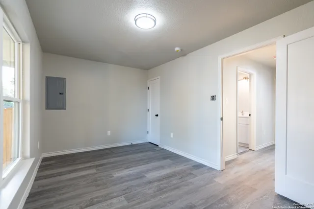 a bathroom with a bathtub a sink and a shower