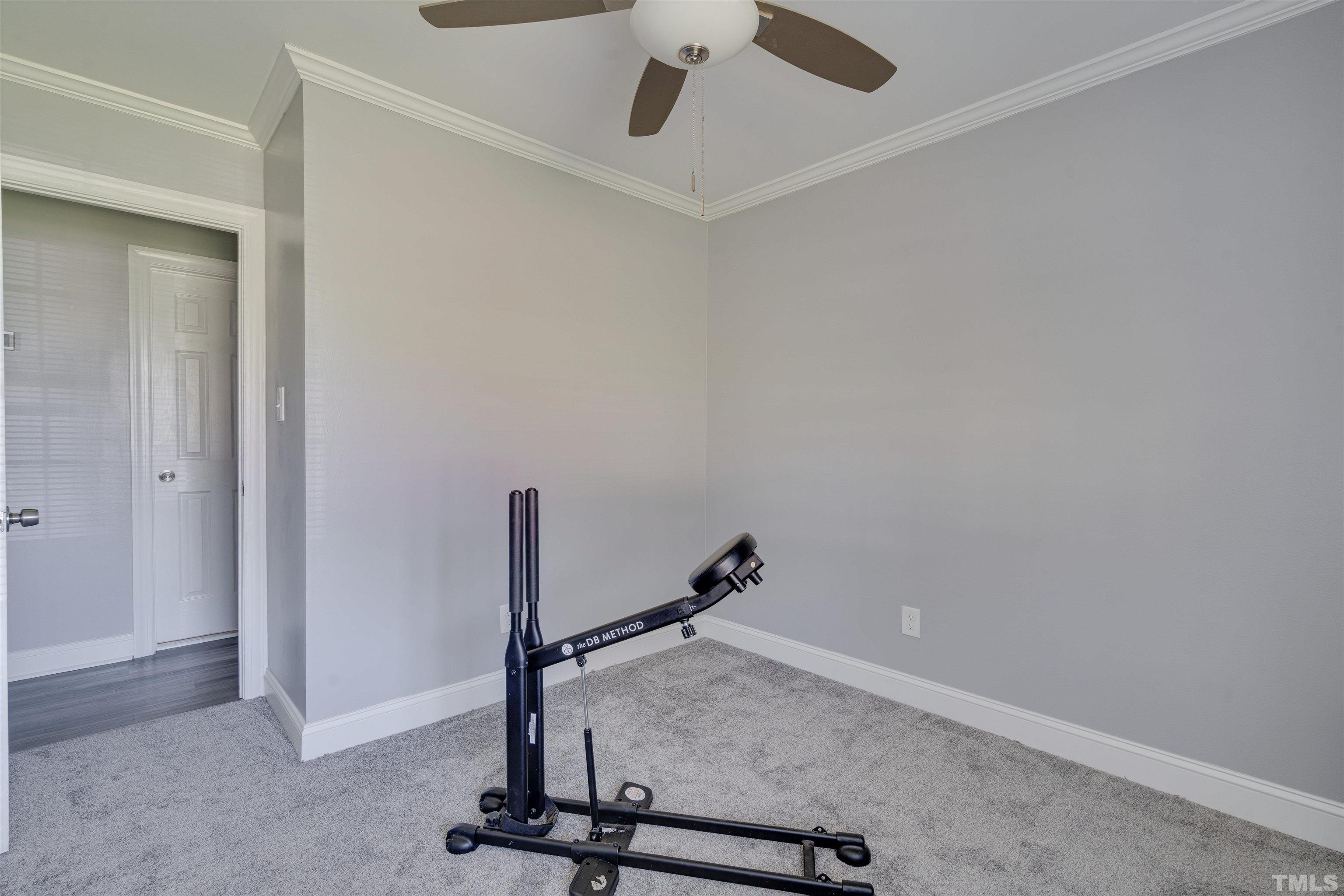 4124 Green Road Raleigh, NC 27604 - Photo 17 of 18 a view of a room with gym equipment