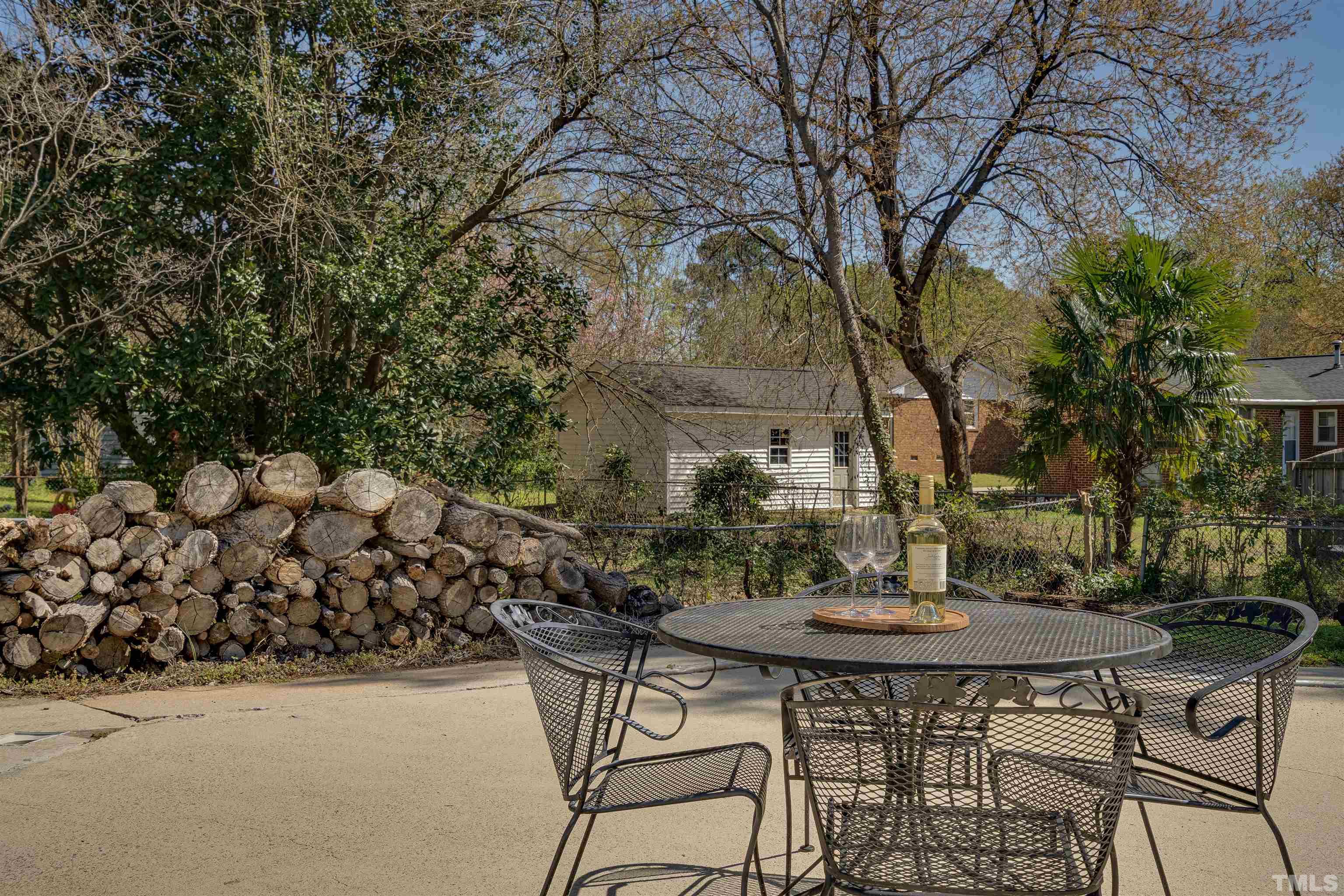 4124 Green Road Raleigh, NC 27604 - Photo 6 of 18 a view of an chairs and table in the patio