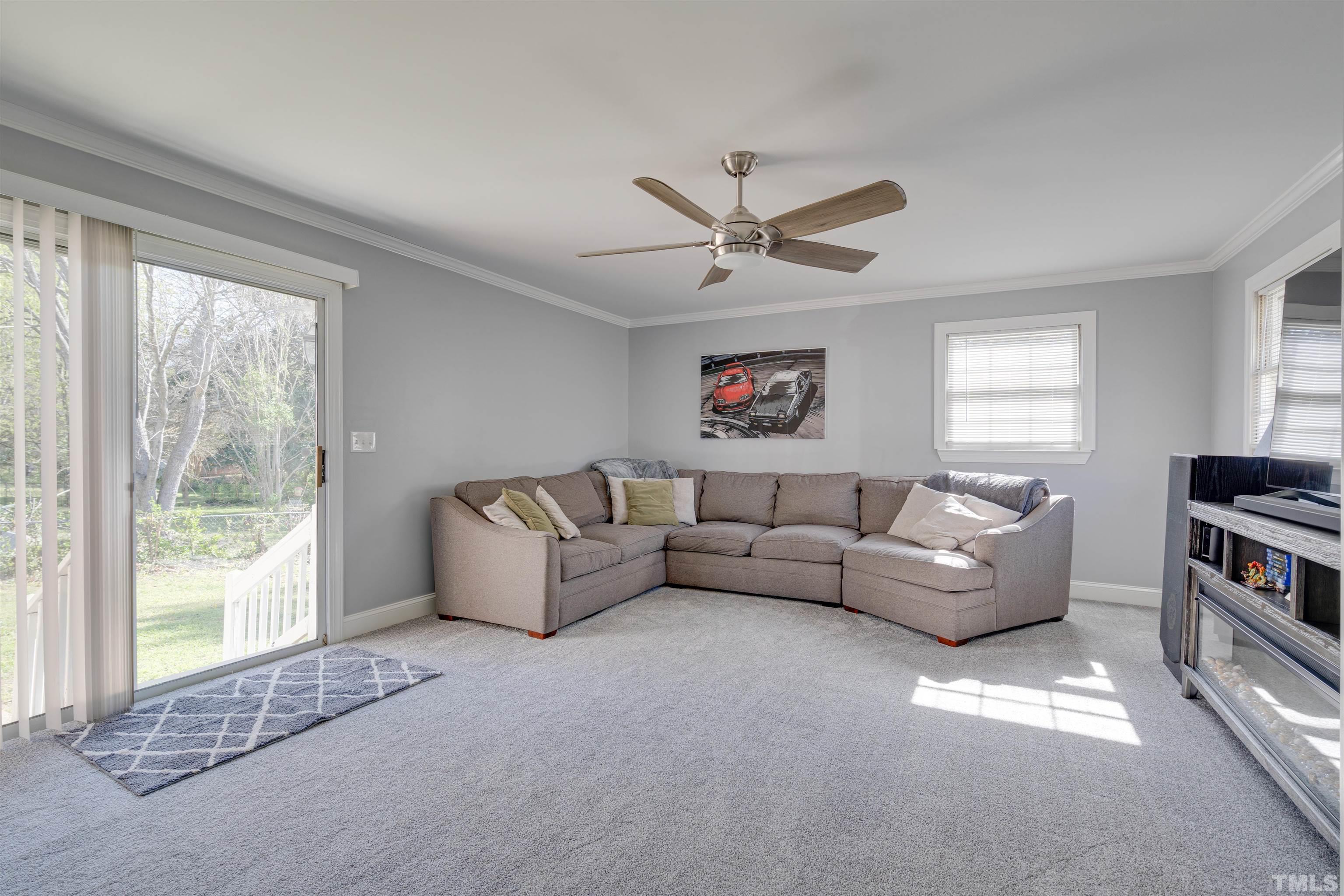 4124 Green Road Raleigh, NC 27604 - Photo 9 of 18 a living room with furniture and a window