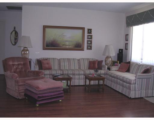 1754 Southeast Lafayette Street Stuart, FL 34997 - Photo 3 of 4 a living room with furniture and a window