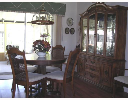 1754 Southeast Lafayette Street Stuart, FL 34997 - Photo 4 of 4 a view of a dining room with furniture window and outside view