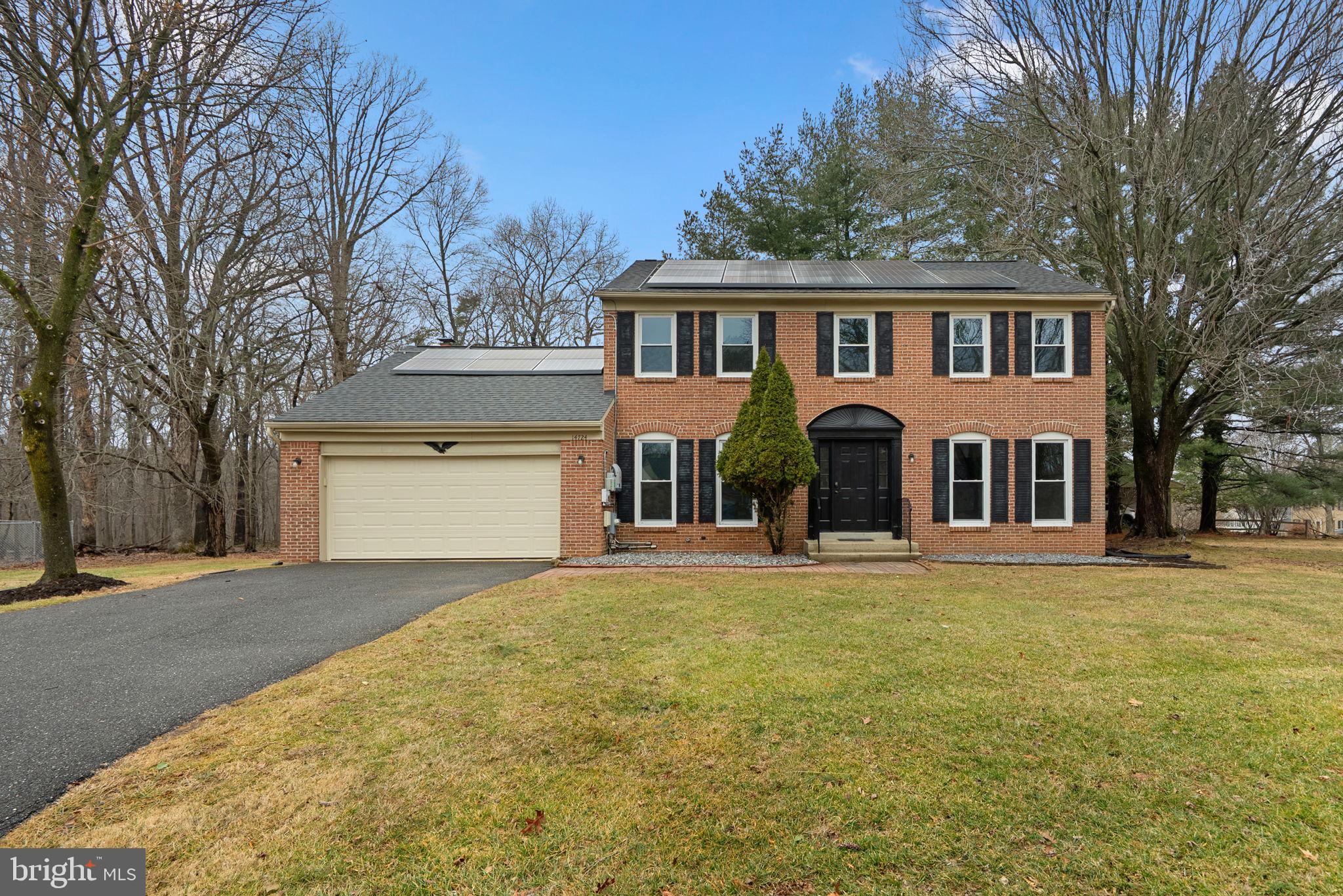 14724 Harvest Lane Silver Spring, MD 20905 - Photo 1 of 53 a front view of a house with a yard