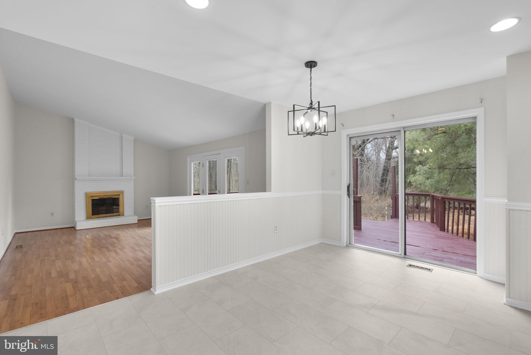 14724 Harvest Lane Silver Spring, MD 20905 - Photo 18 of 53 a view of an empty room with glass door