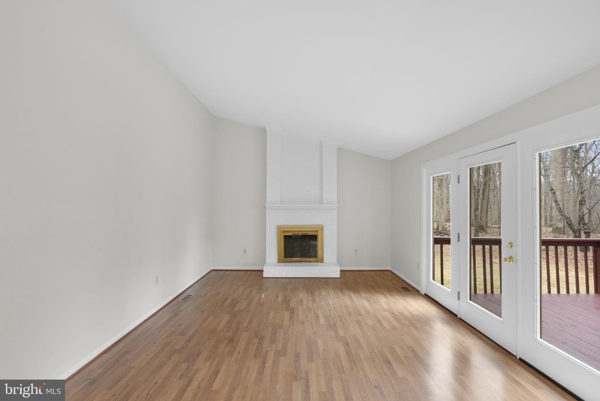 14724 Harvest Lane Silver Spring, MD 20905 - Photo 21 of 53 wooden floor fireplace and entryway in a room
