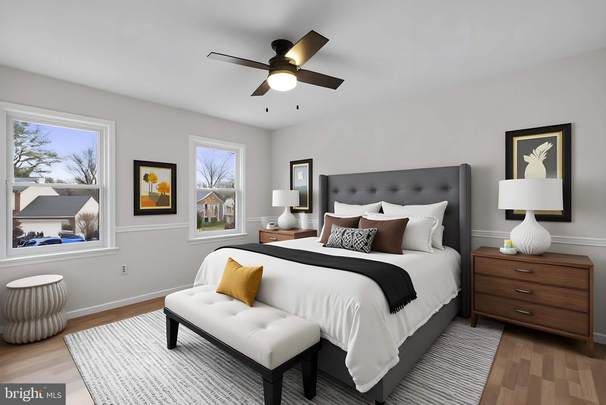 14724 Harvest Lane Silver Spring, MD 20905 - Photo 38 of 53 a bedroom with a bed and a couch
