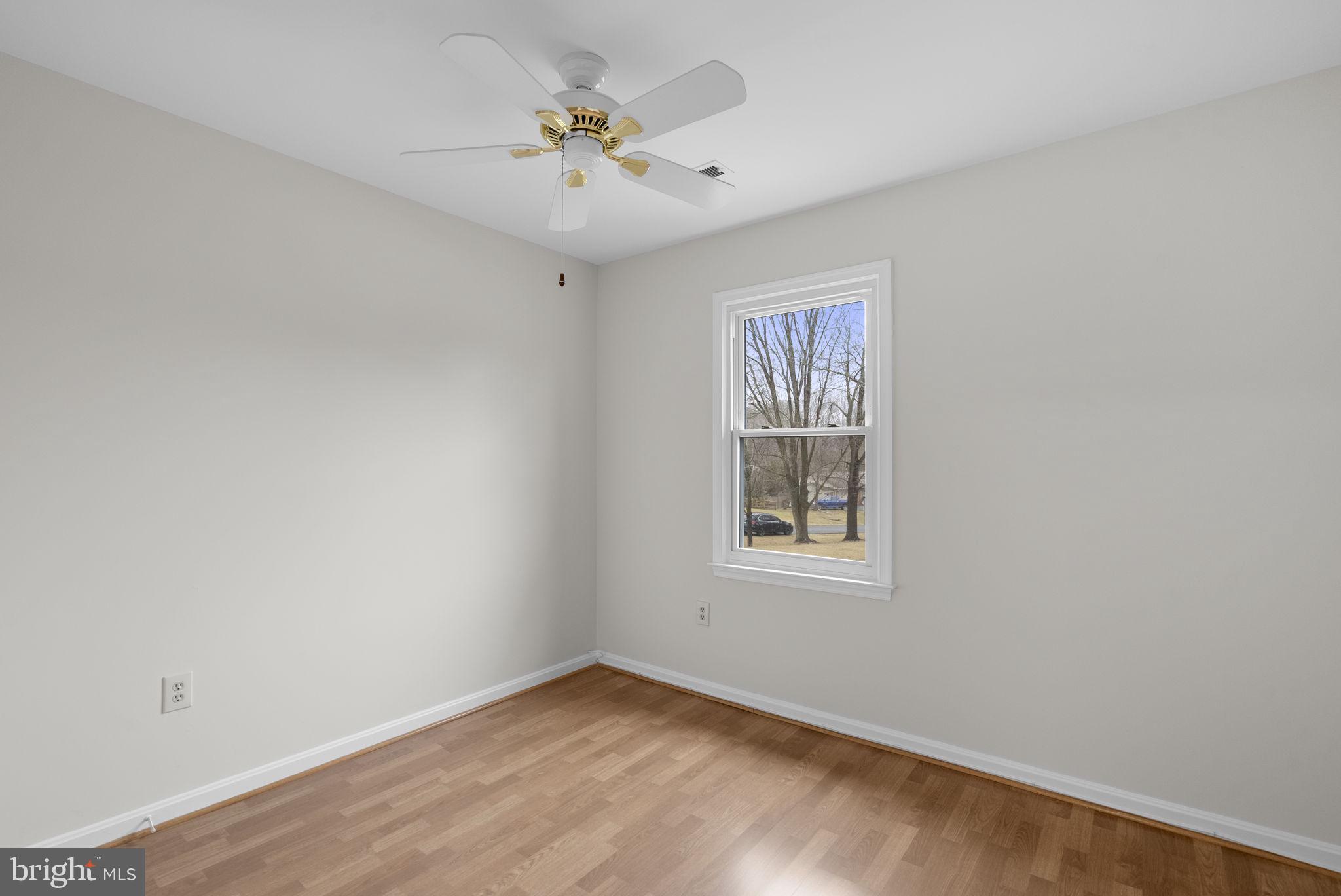14724 Harvest Lane Silver Spring, MD 20905 - Photo 42 of 53 an empty room with a window