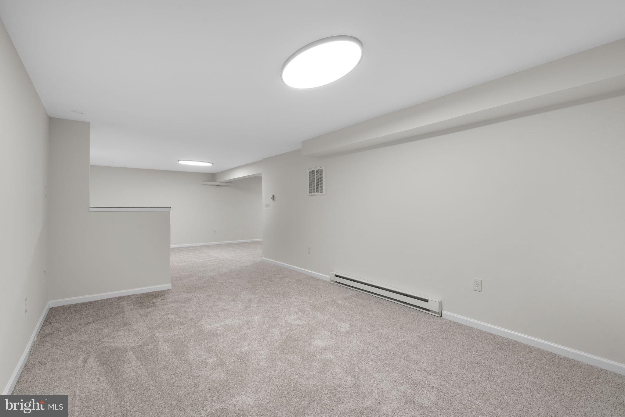 14724 Harvest Lane Silver Spring, MD 20905 - Photo 49 of 53 a view of an empty room