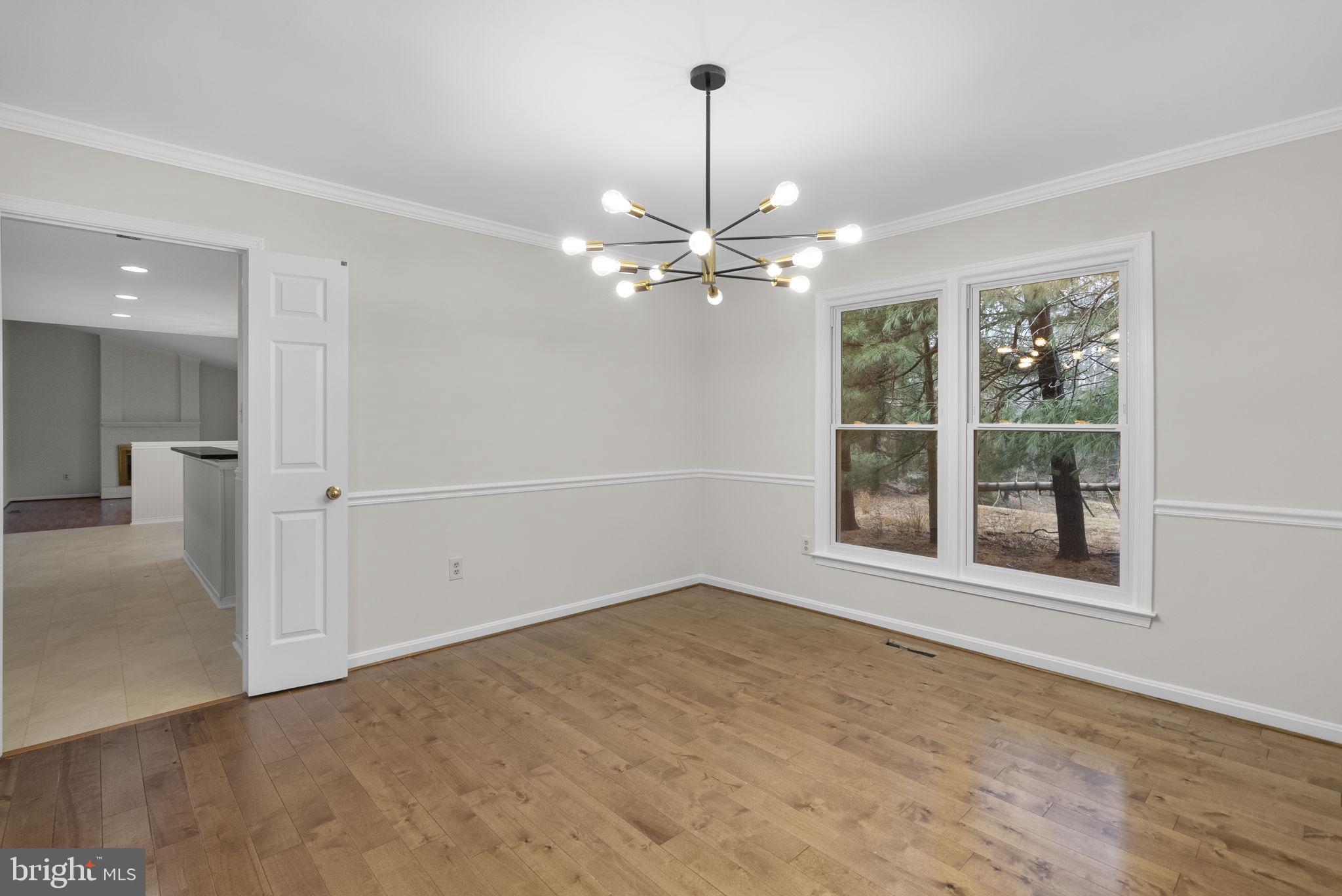 14724 Harvest Lane Silver Spring, MD 20905 - Photo 10 of 53 an empty room with fan and windows