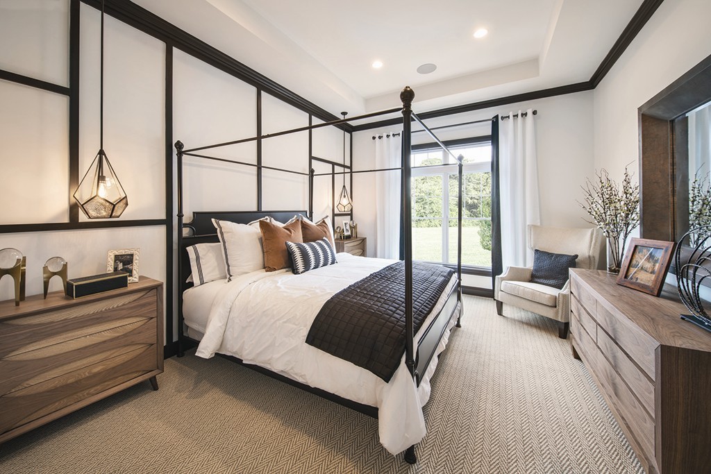 2 Hummingbird Way, Unit 1 Methuen, MA 01844 - Photo 6 of 10 a spacious bedroom with a bed and a large window