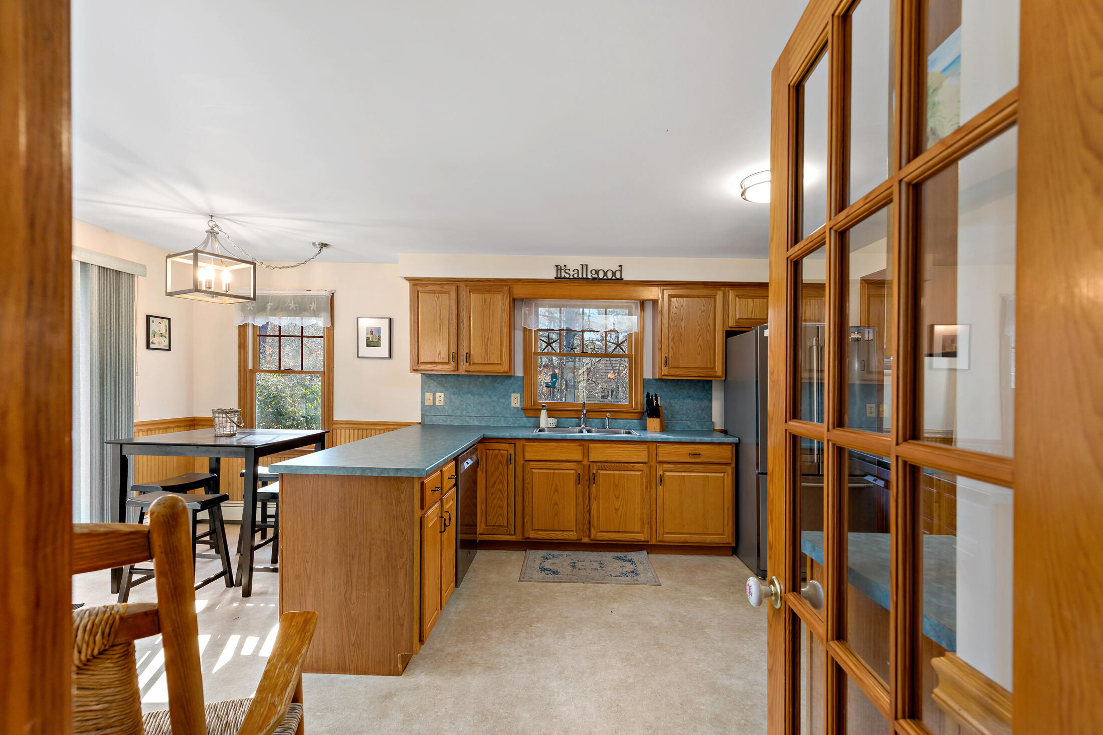 25 Forrest Avenue Eastham, MA 02642 - Photo 11 of 46 a kitchen with stainless steel appliances granite countertop a refrigerator and a stove top oven
