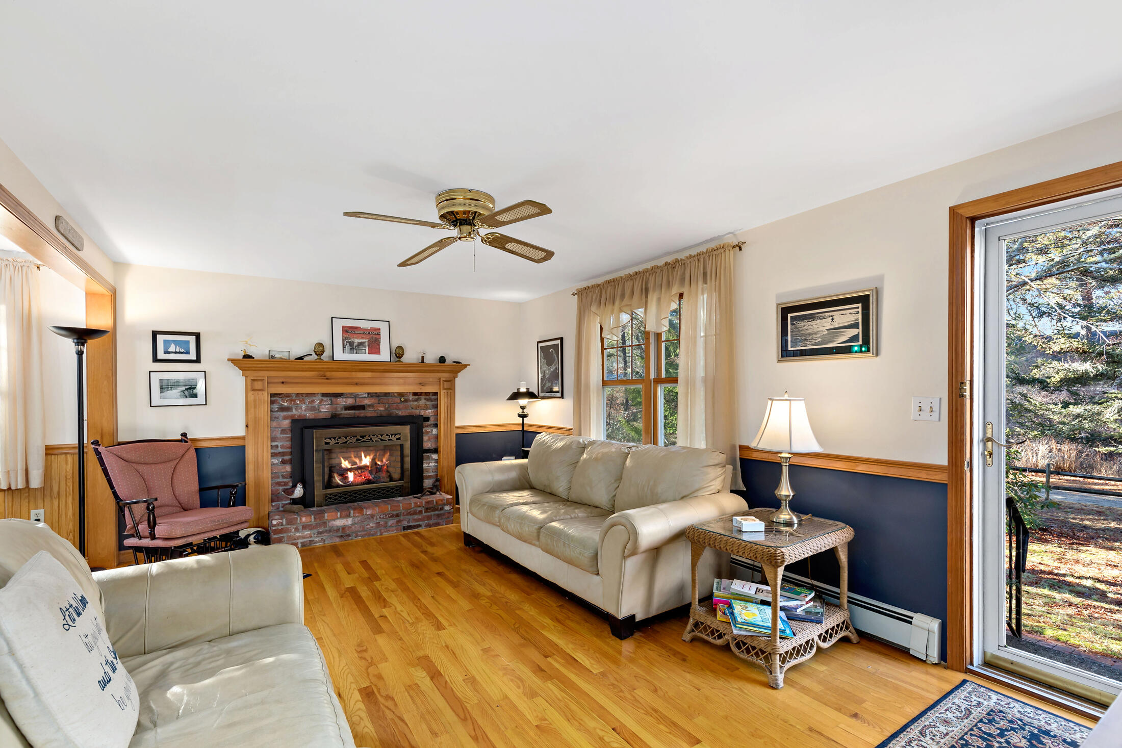 25 Forrest Avenue Eastham, MA 02642 - Photo 22 of 46 a living room with furniture or couch and a fireplace