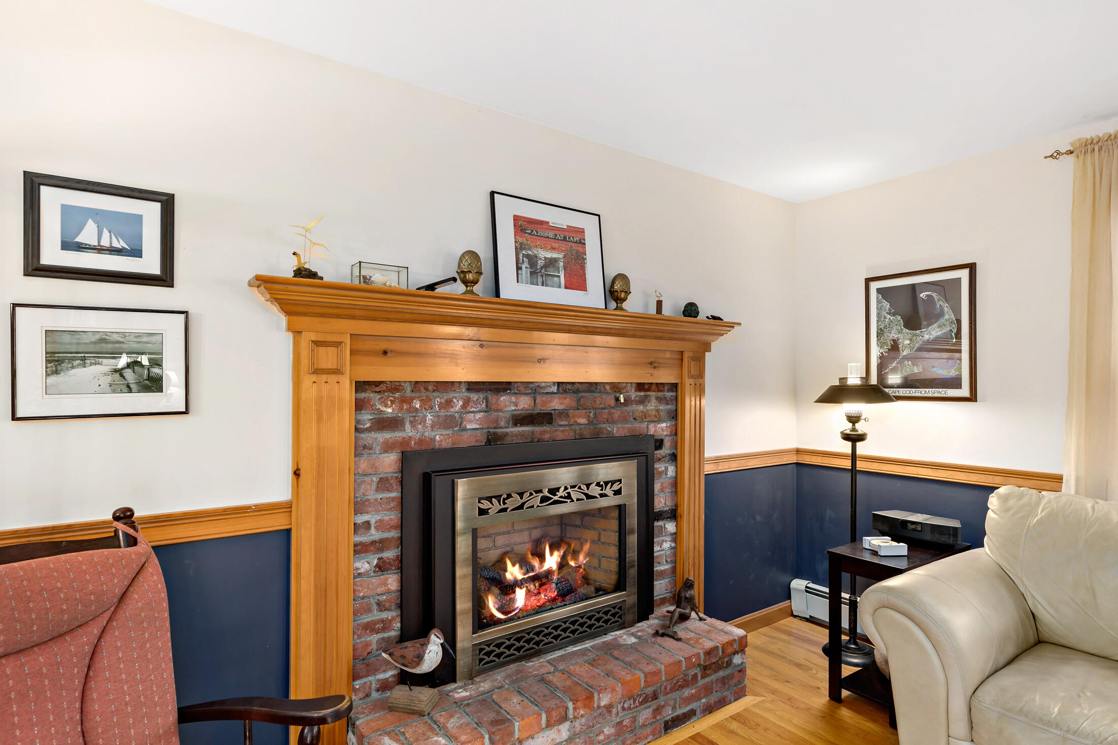 25 Forrest Avenue Eastham, MA 02642 - Photo 23 of 46 a living room with furniture and a fireplace