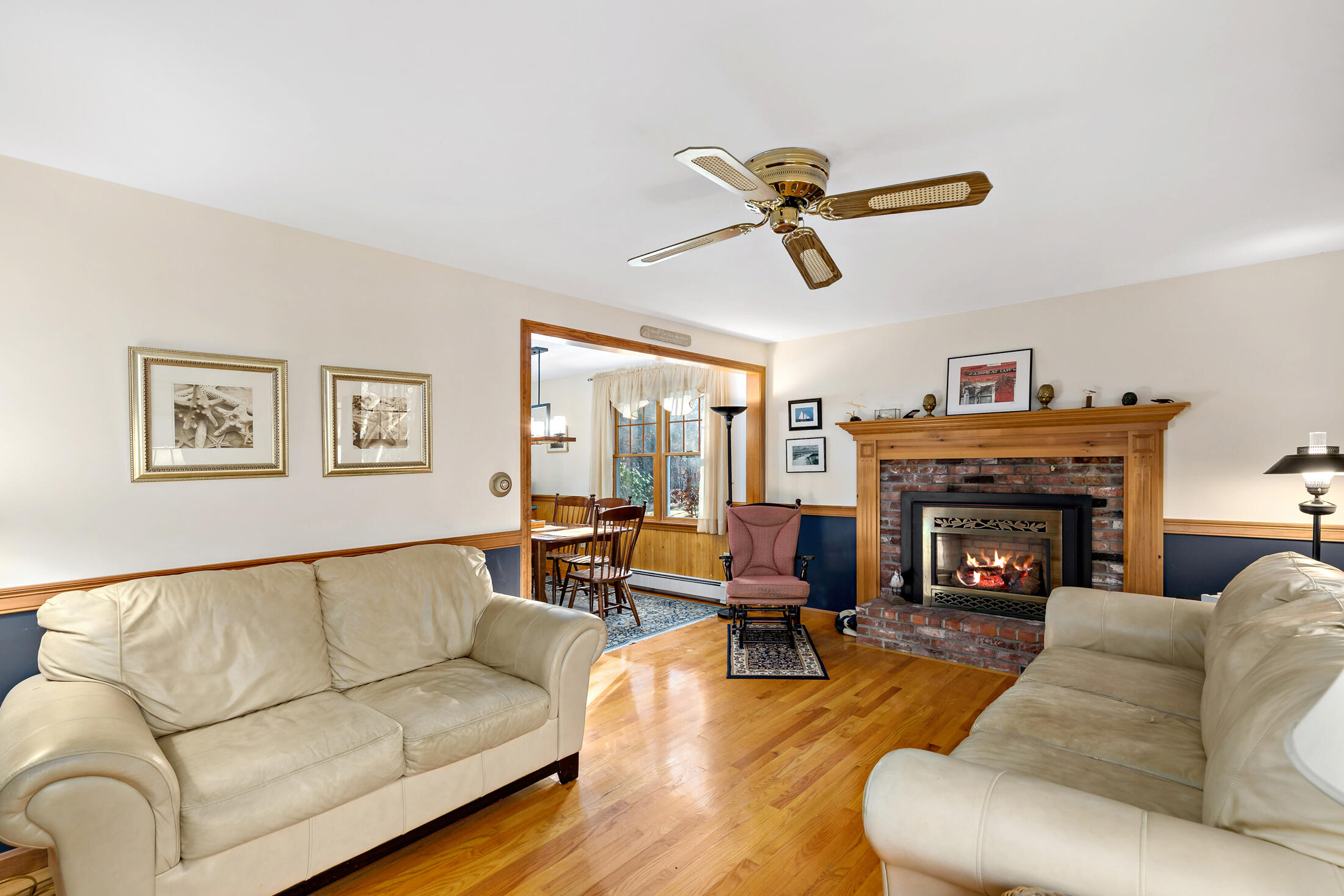 25 Forrest Avenue Eastham, MA 02642 - Photo 24 of 46 a living room with furniture and a fireplace