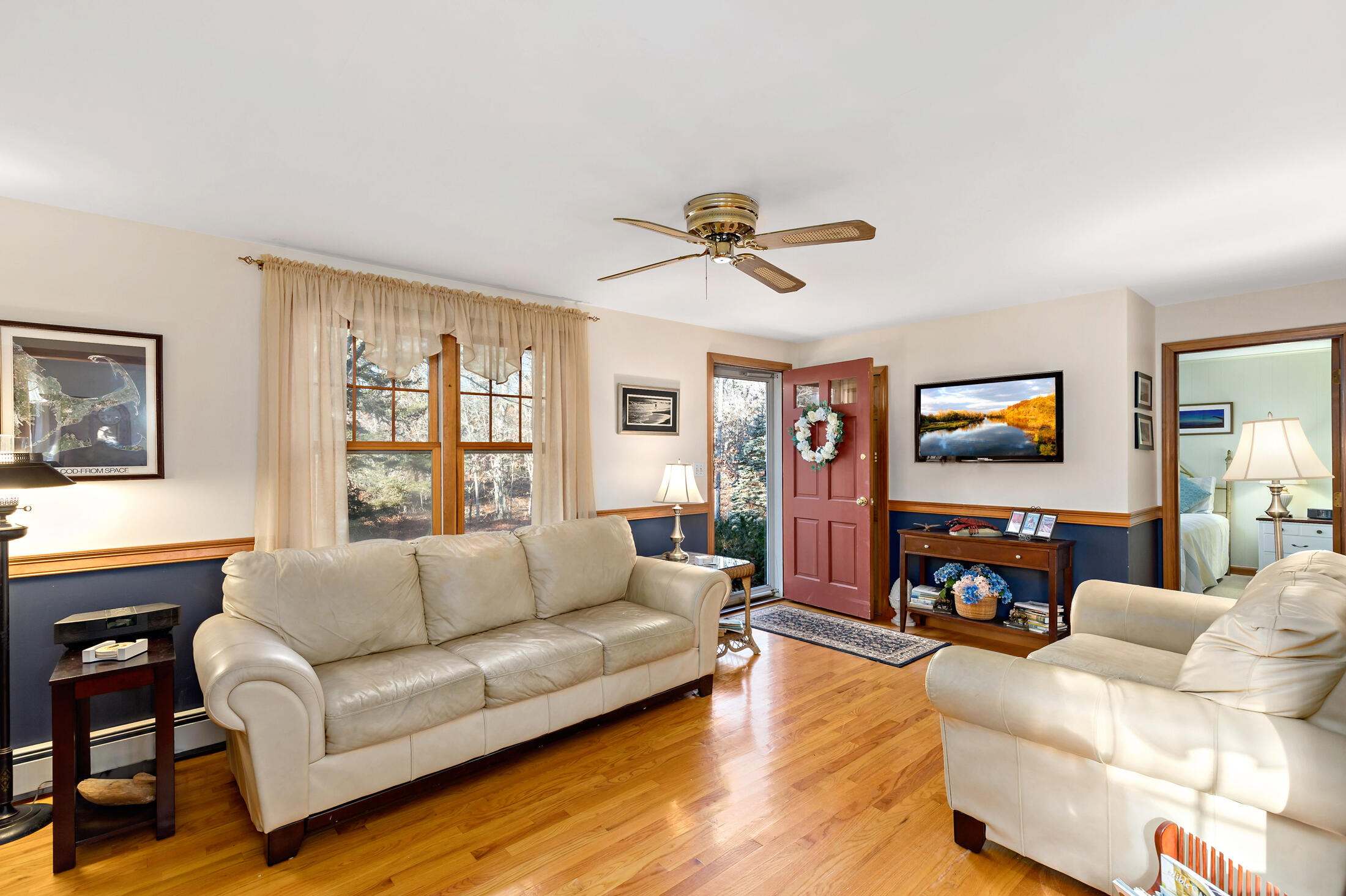 25 Forrest Avenue Eastham, MA 02642 - Photo 25 of 46 a living room with furniture and a flat screen tv