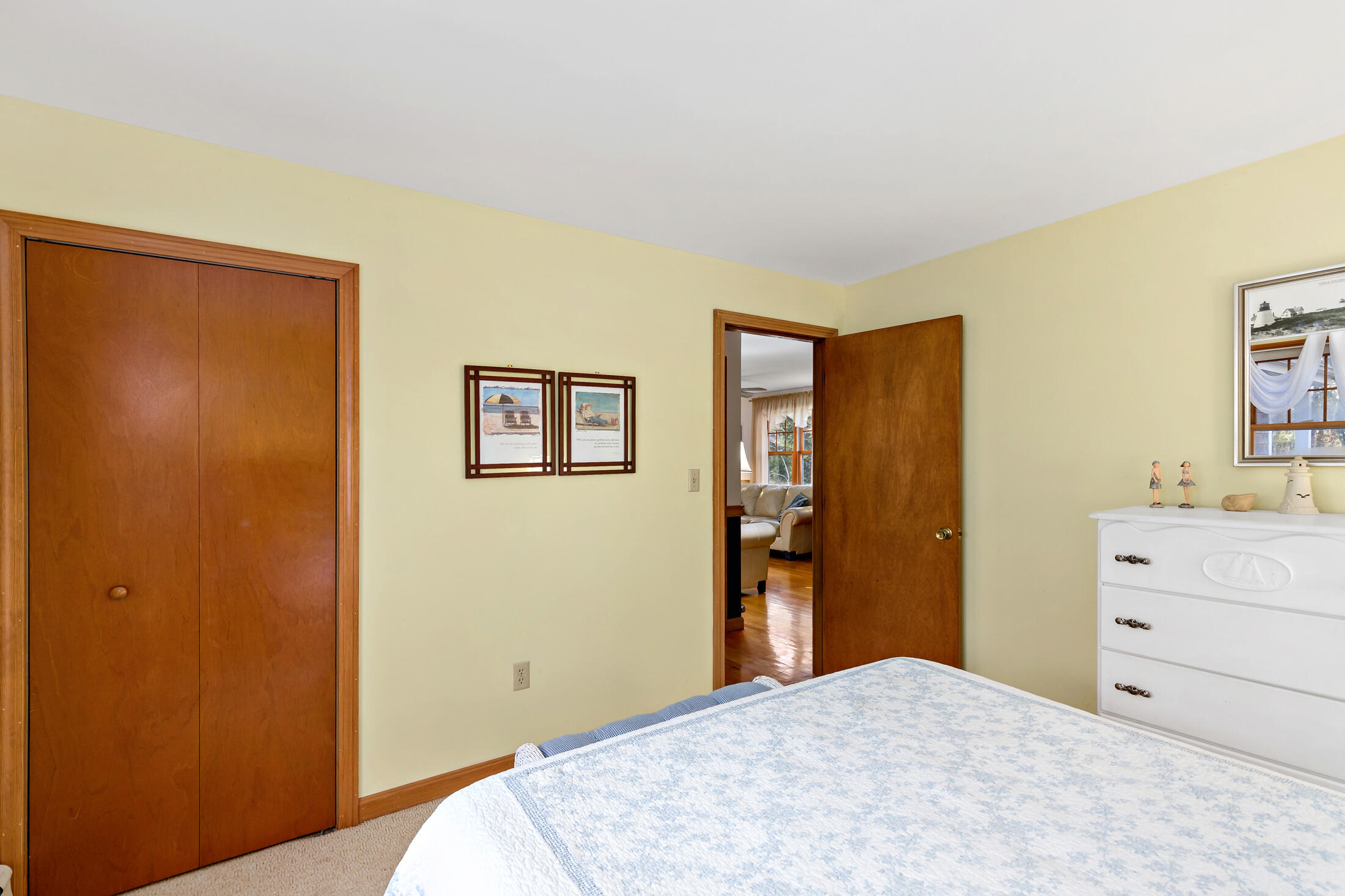 25 Forrest Avenue Eastham, MA 02642 - Photo 30 of 46 a bedroom with a bed and a dresser