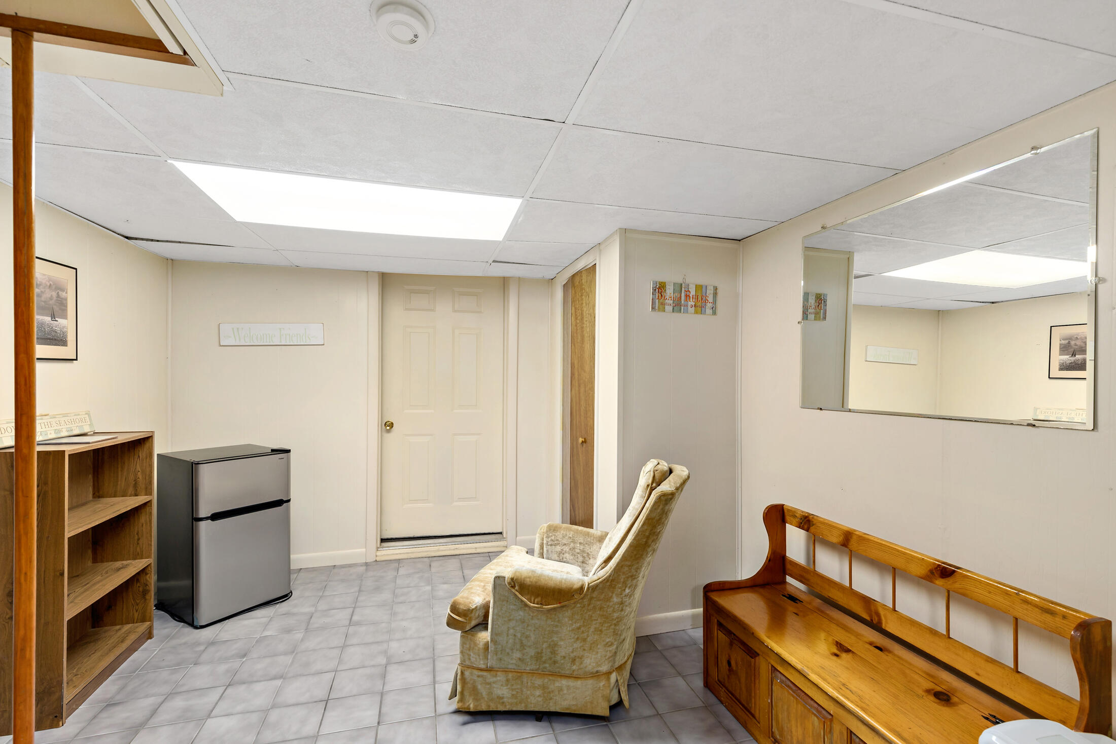 25 Forrest Avenue Eastham, MA 02642 - Photo 33 of 46 a hallway with furniture and stairs