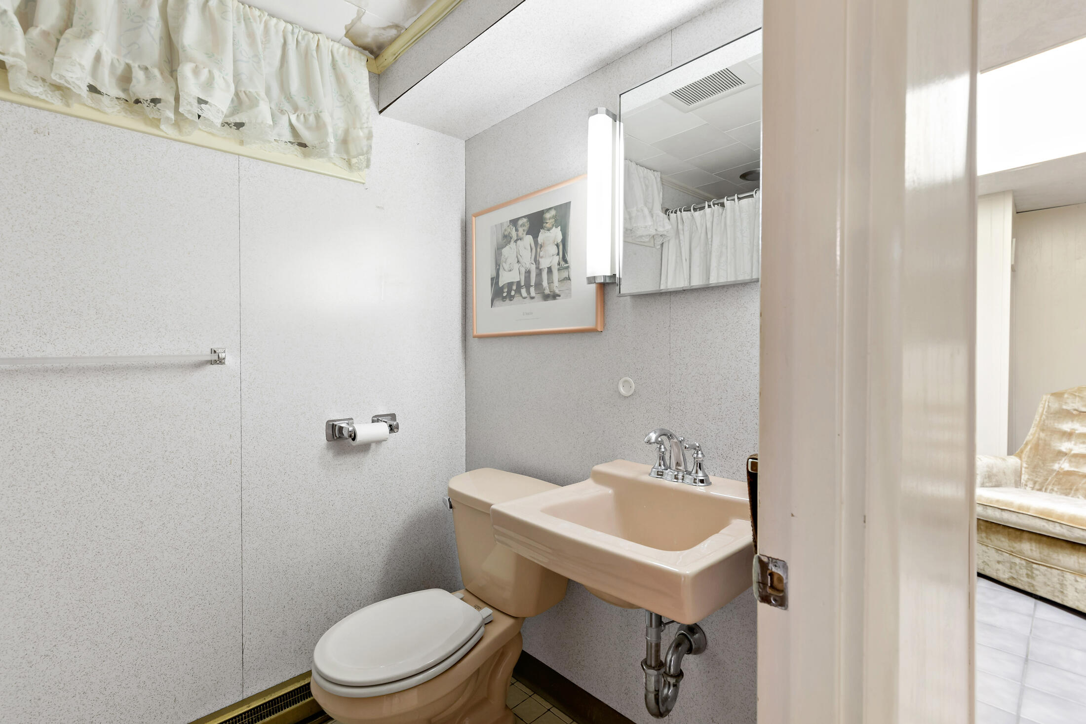 25 Forrest Avenue Eastham, MA 02642 - Photo 37 of 46 a bathroom with a toilet a sink and mirror