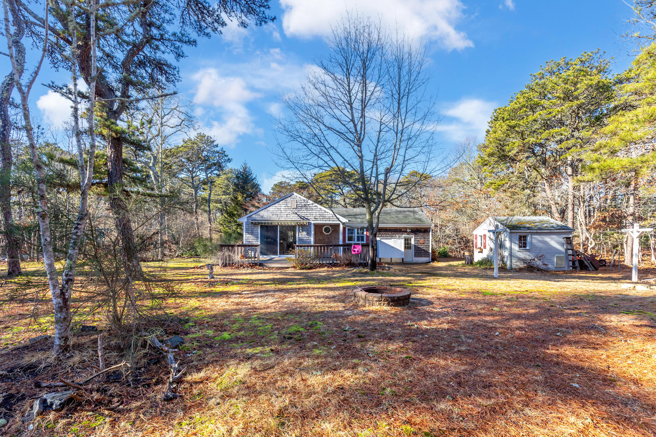 25 Forrest Avenue Eastham, MA 02642 - Photo 6 of 46 a front view of a house with a yard
