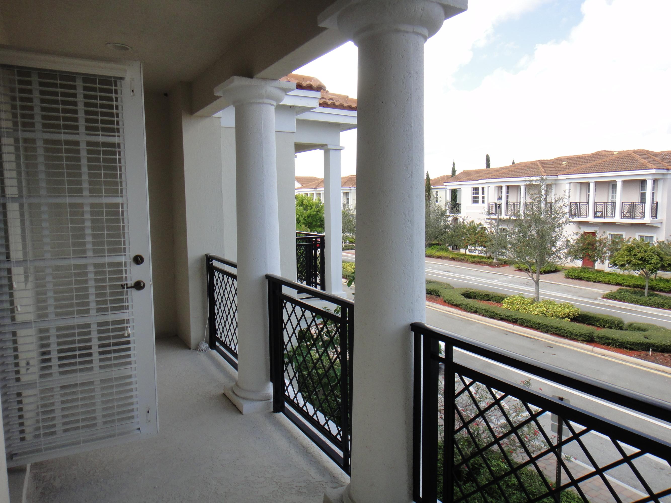 819 Northwest 82nd Place Boca Raton, FL 33487 - Photo 9 of 17 master balcony