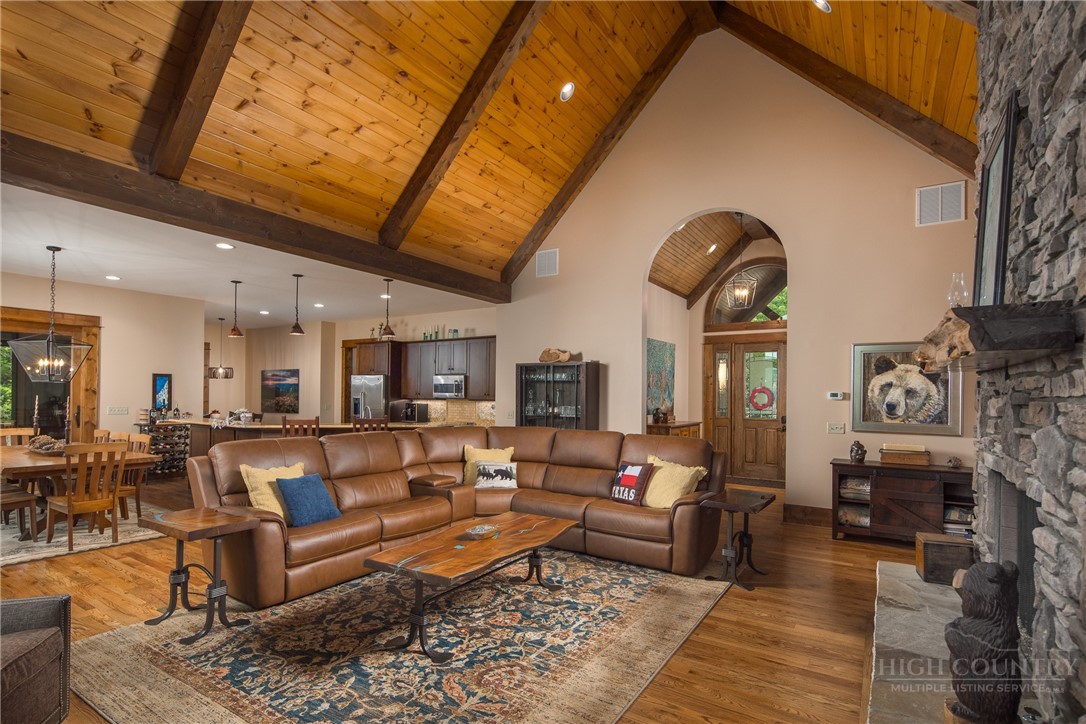 115 Passionflower Trail Boone, NC 28607 - Photo 4 of 50 a living room with furniture and a fireplace