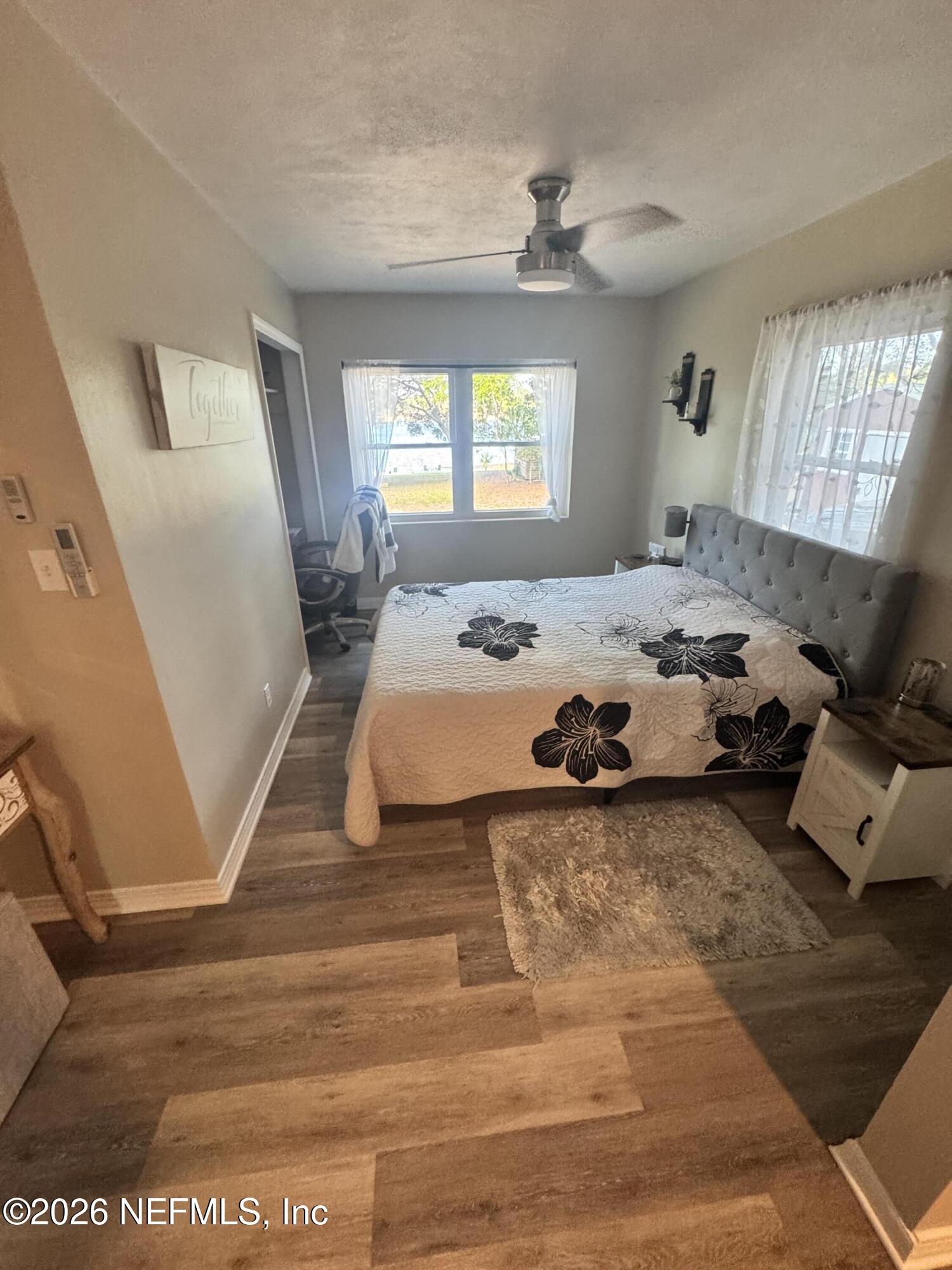 113 Stock Avenue Interlachen, FL 32148 - Photo 19 of 50 a bed room with a bed and a window