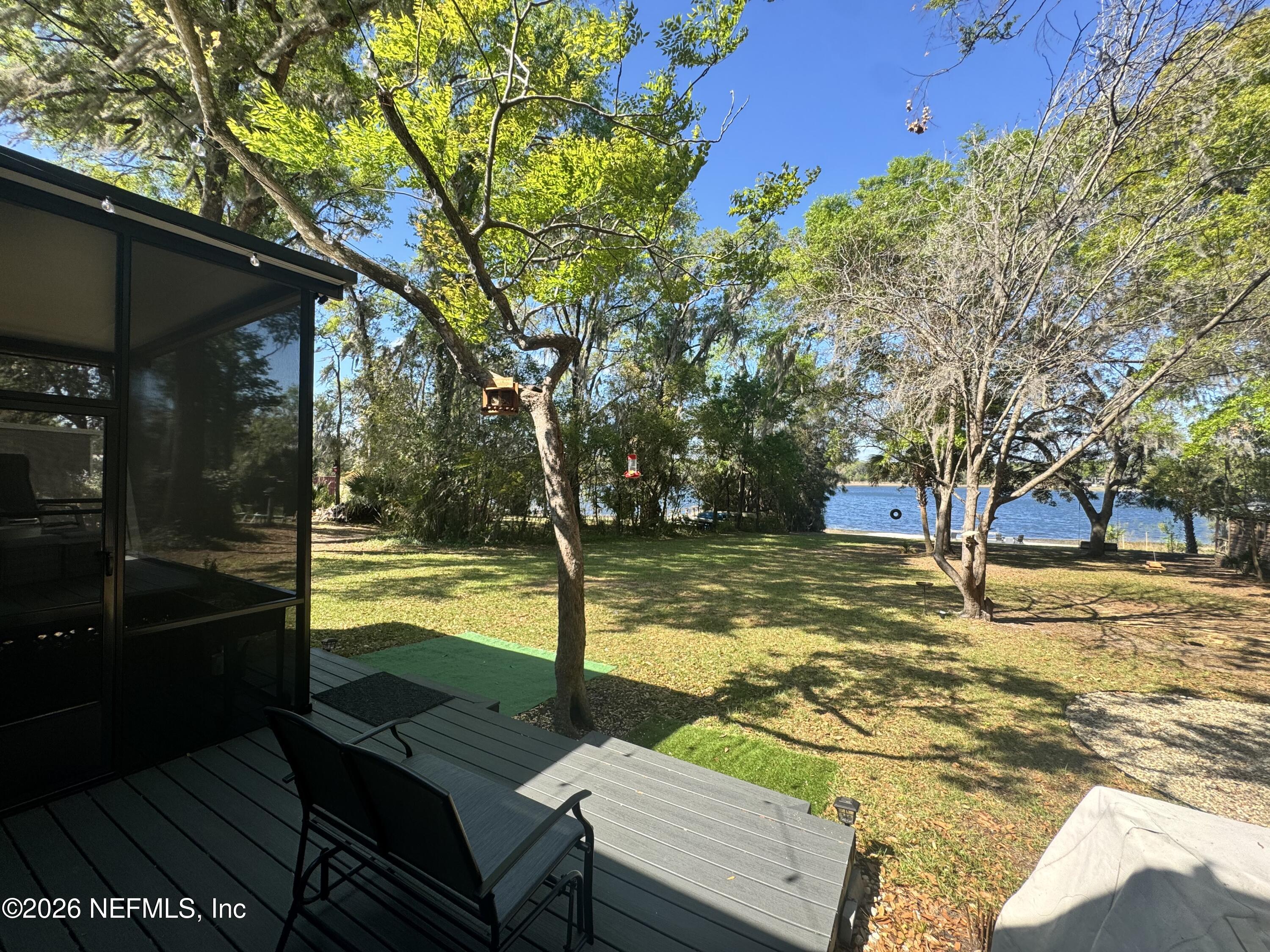 113 Stock Avenue Interlachen, FL 32148 - Photo 33 of 50 a view of a yard with swimming pool