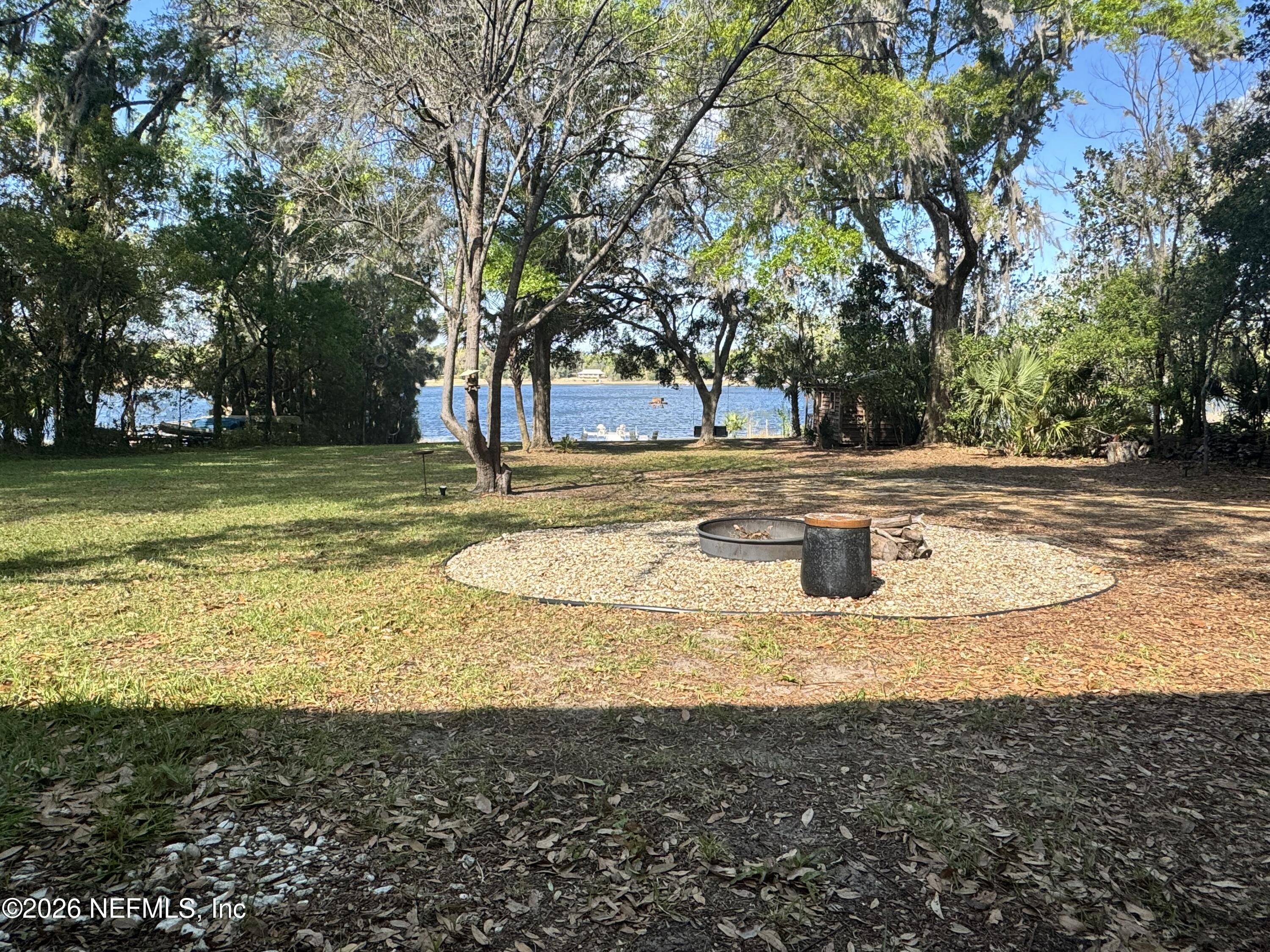 113 Stock Avenue Interlachen, FL 32148 - Photo 35 of 50 a view of a yard with trees