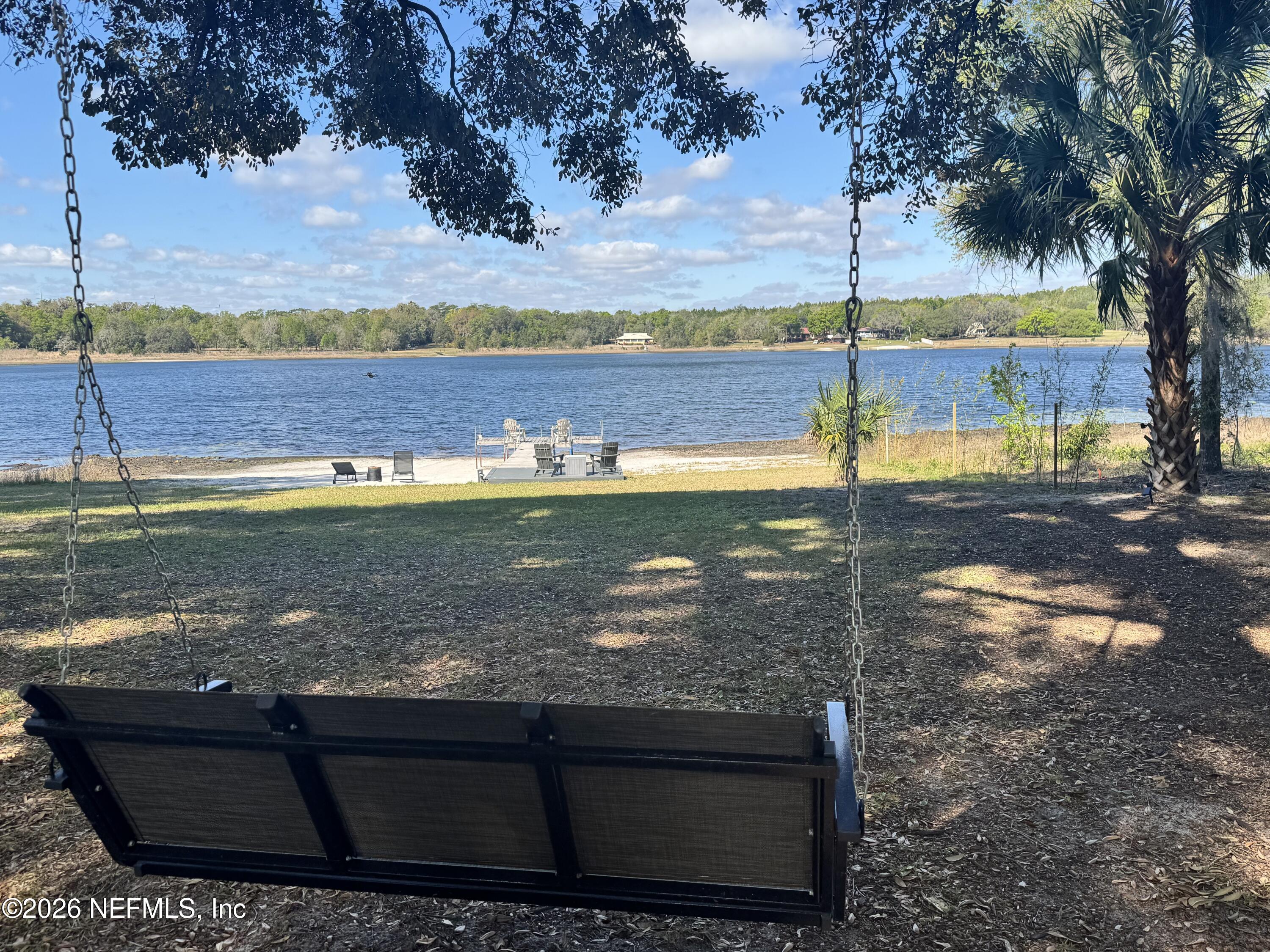 113 Stock Avenue Interlachen, FL 32148 - Photo 38 of 50 a view of a lake with a big yard