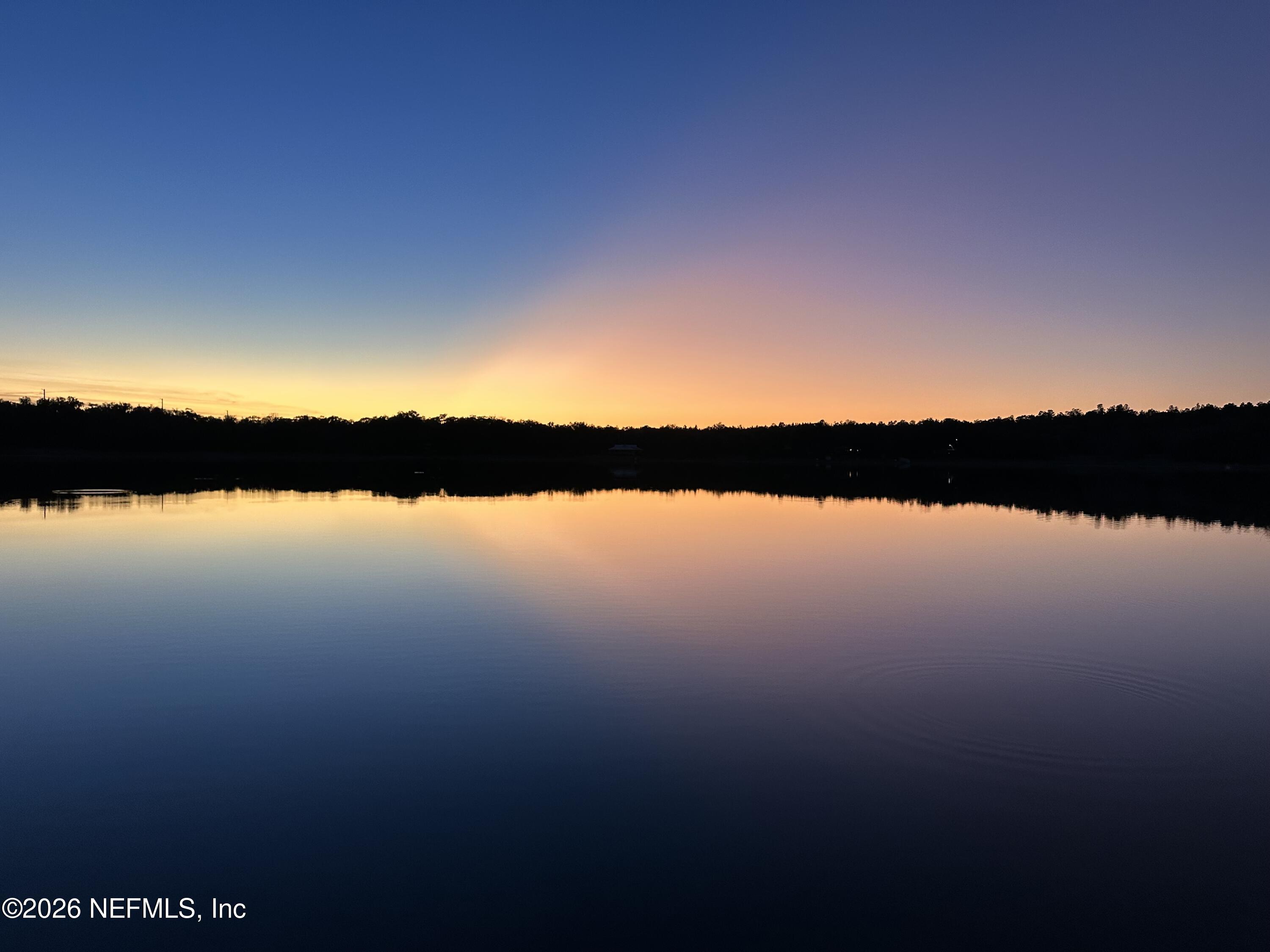 113 Stock Avenue Interlachen, FL 32148 - Photo 49 of 50 a view of lake and sunset