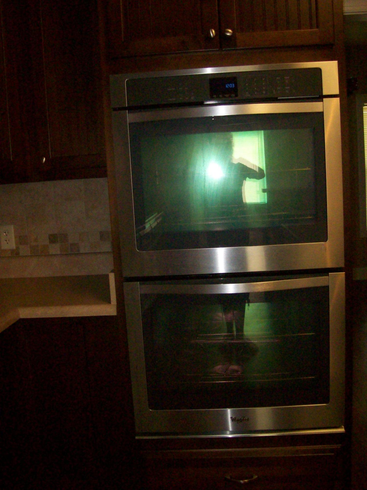 8130 Jordan Road Baker, FL 32531 - Photo 13 of 61 a stove top oven sitting inside of a kitchen