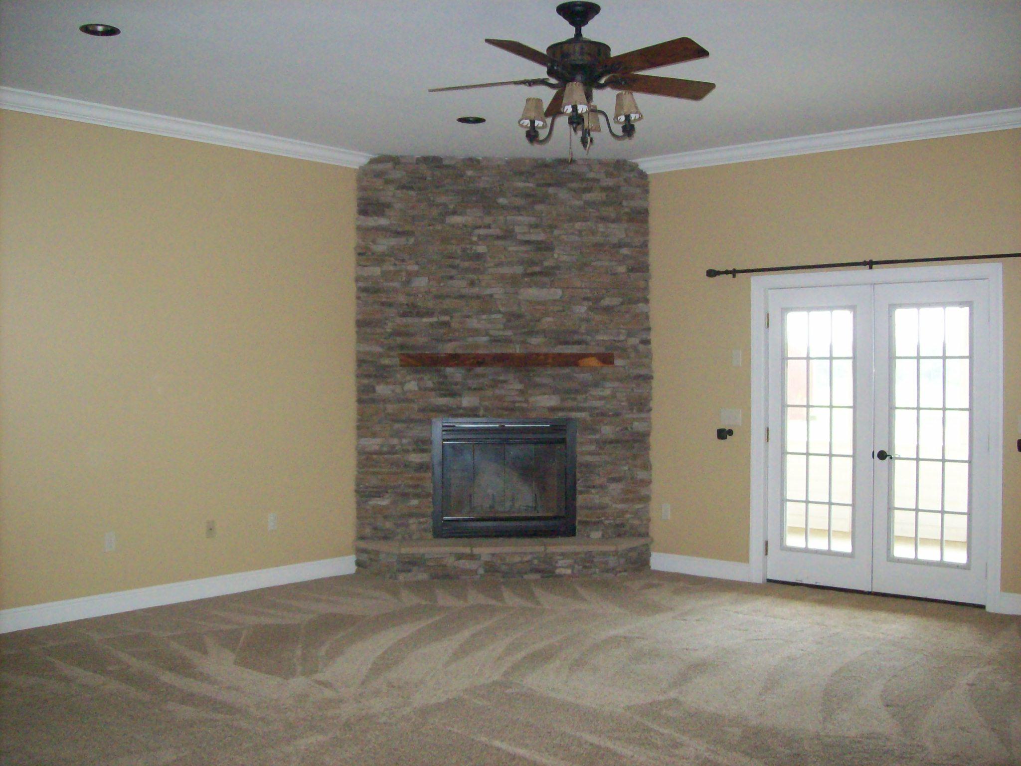 8130 Jordan Road Baker, FL 32531 - Photo 19 of 61 a view of an empty room with a fireplace and a window