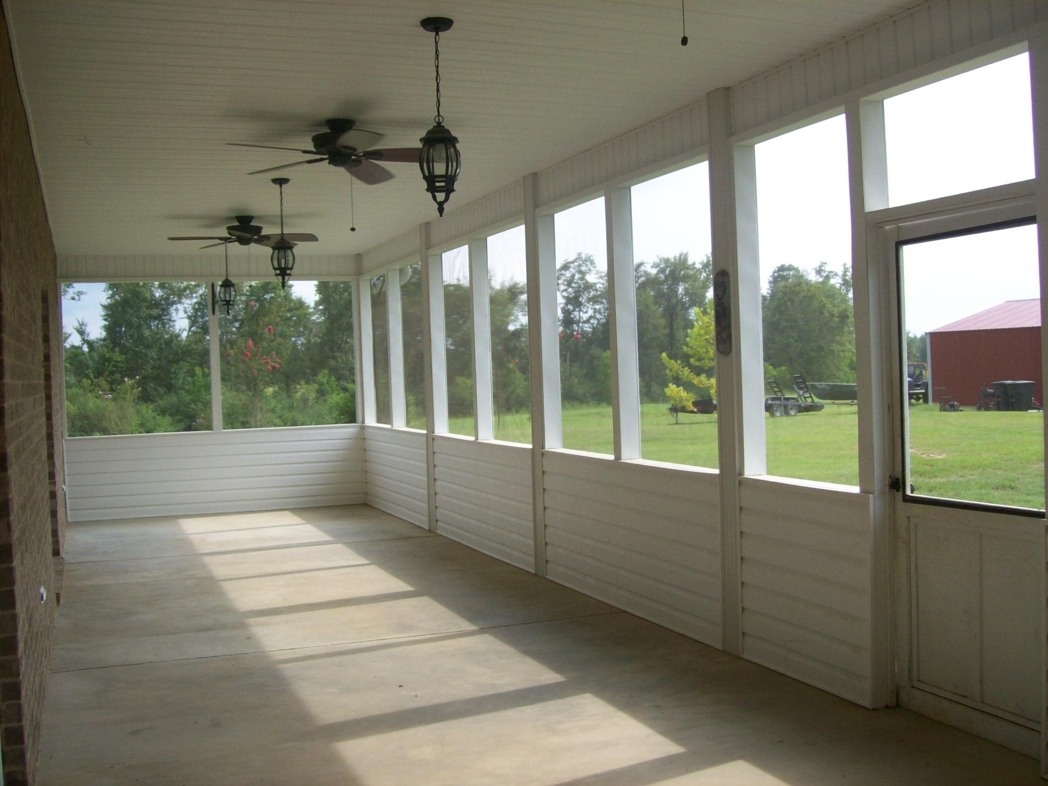 8130 Jordan Road Baker, FL 32531 - Photo 27 of 61 a view of an empty room with a window and chandelier