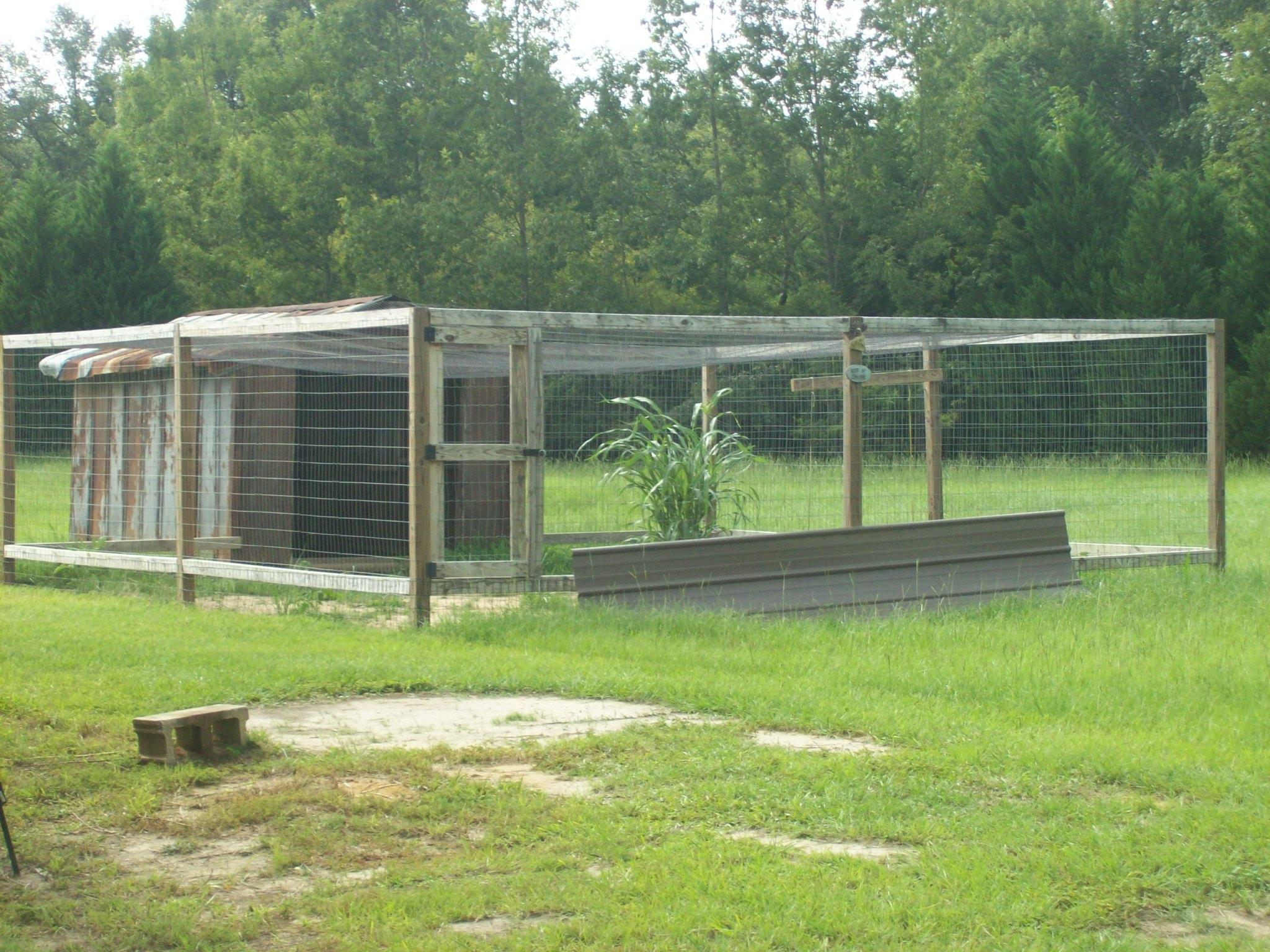 8130 Jordan Road Baker, FL 32531 - Photo 41 of 61 a view of a backyard with a garden and entertaining space