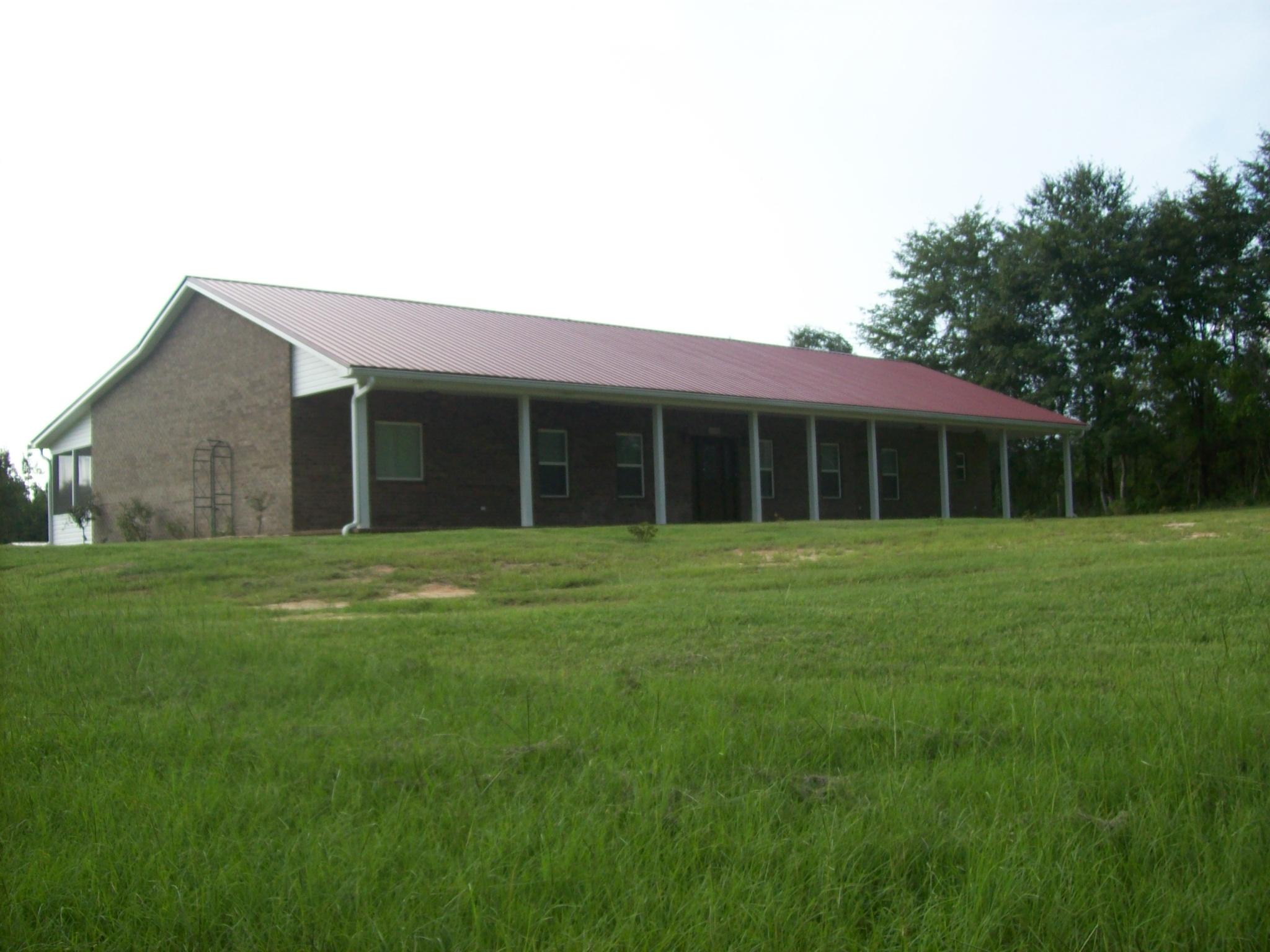 8130 Jordan Road Baker, FL 32531 - Photo 56 of 61 a view of a house with a backyard