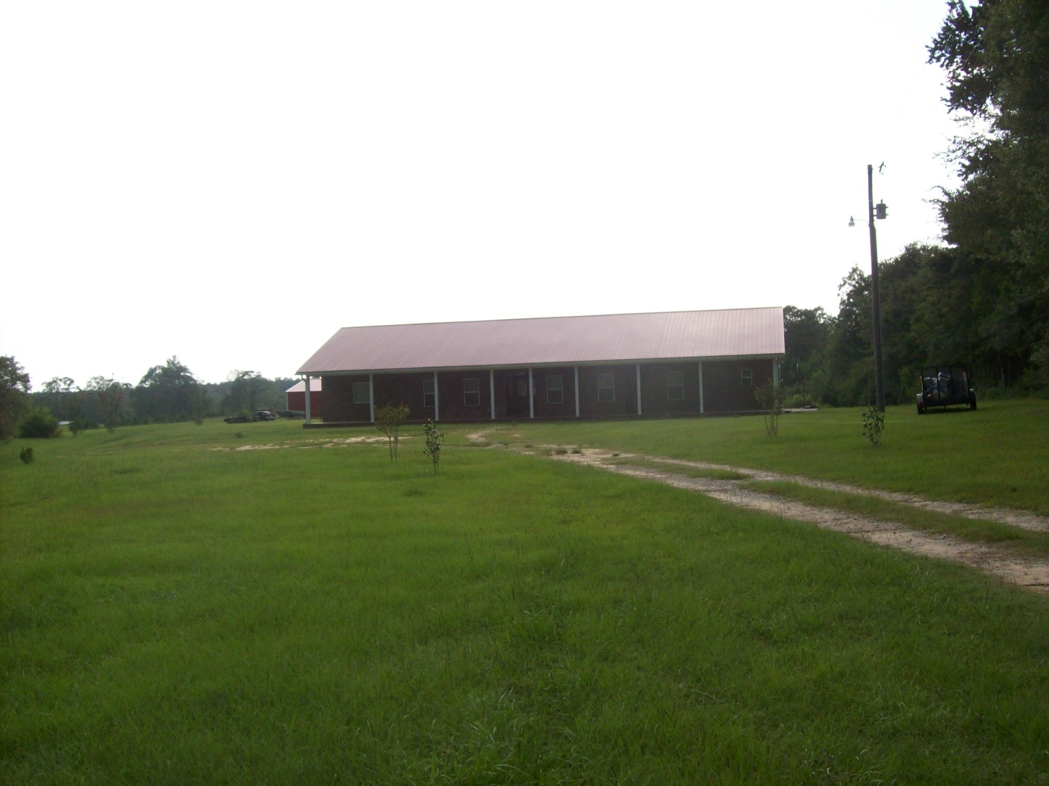 8130 Jordan Road Baker, FL 32531 - Photo 61 of 61 a view of a green field with wooden fence