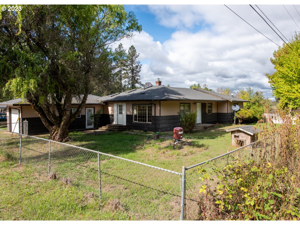 29853 Jarding Road Eugene, OR 97405 - Photo 1 of 30 a view of a house with swimming pool and a yard
