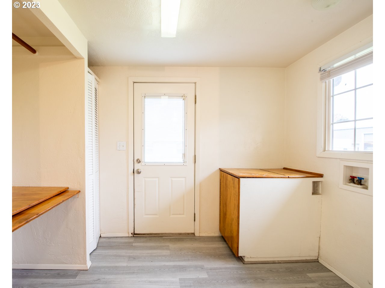 29853 Jarding Road Eugene, OR 97405 - Photo 15 of 30 a view of an empty room with wooden floor and a window