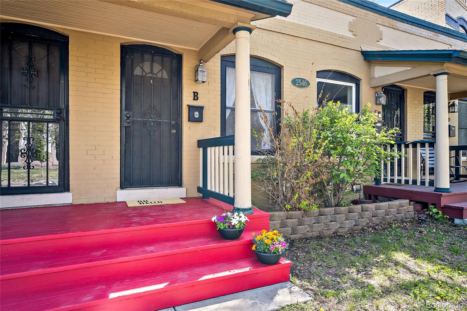 2546 West 23rd Avenue, Unit B Denver, CO 80211 - Photo 2 of 17 a view of a house with a yard