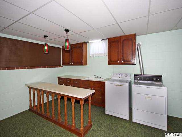 7945 Woodleaf Road Woodleaf, NC 27054 - Photo 10 of 16 a utility room with dryer and washer
