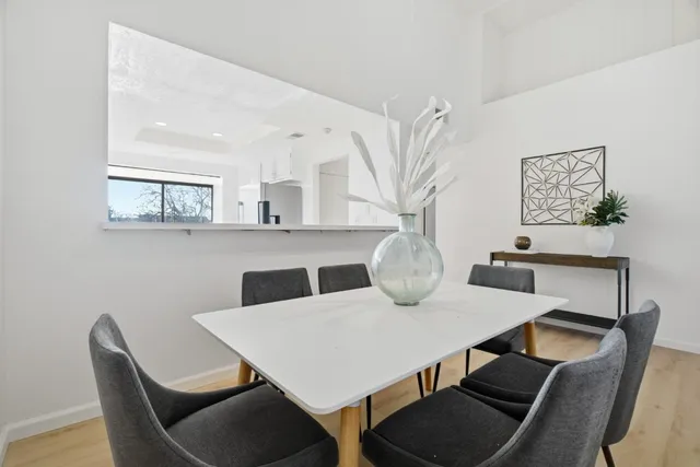 a bedroom with a bed a desk and chair