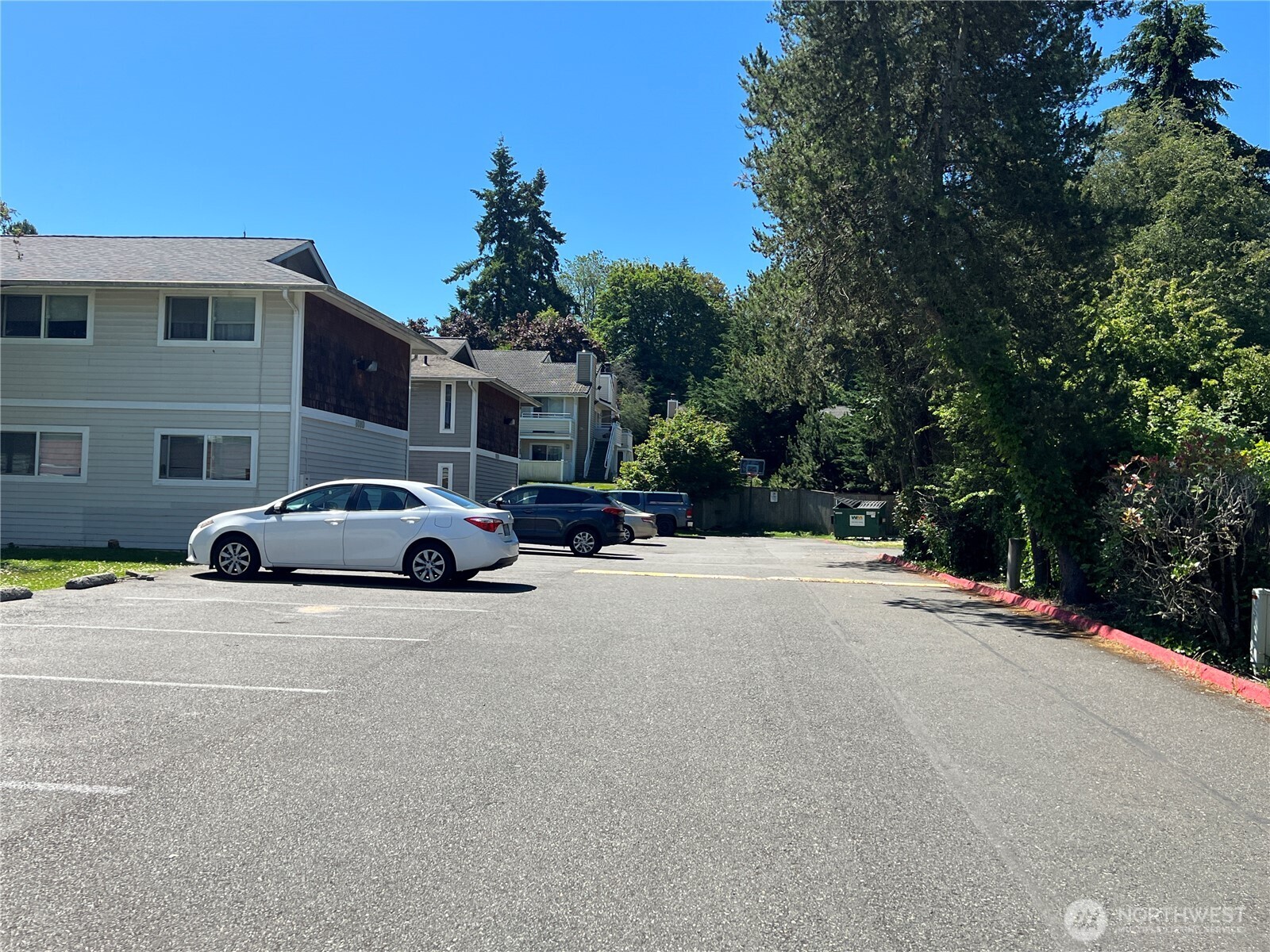 5030 212th Street Southwest Mountlake Terrace, WA 98043 - Photo 7 of 14 a view of street with parked cars