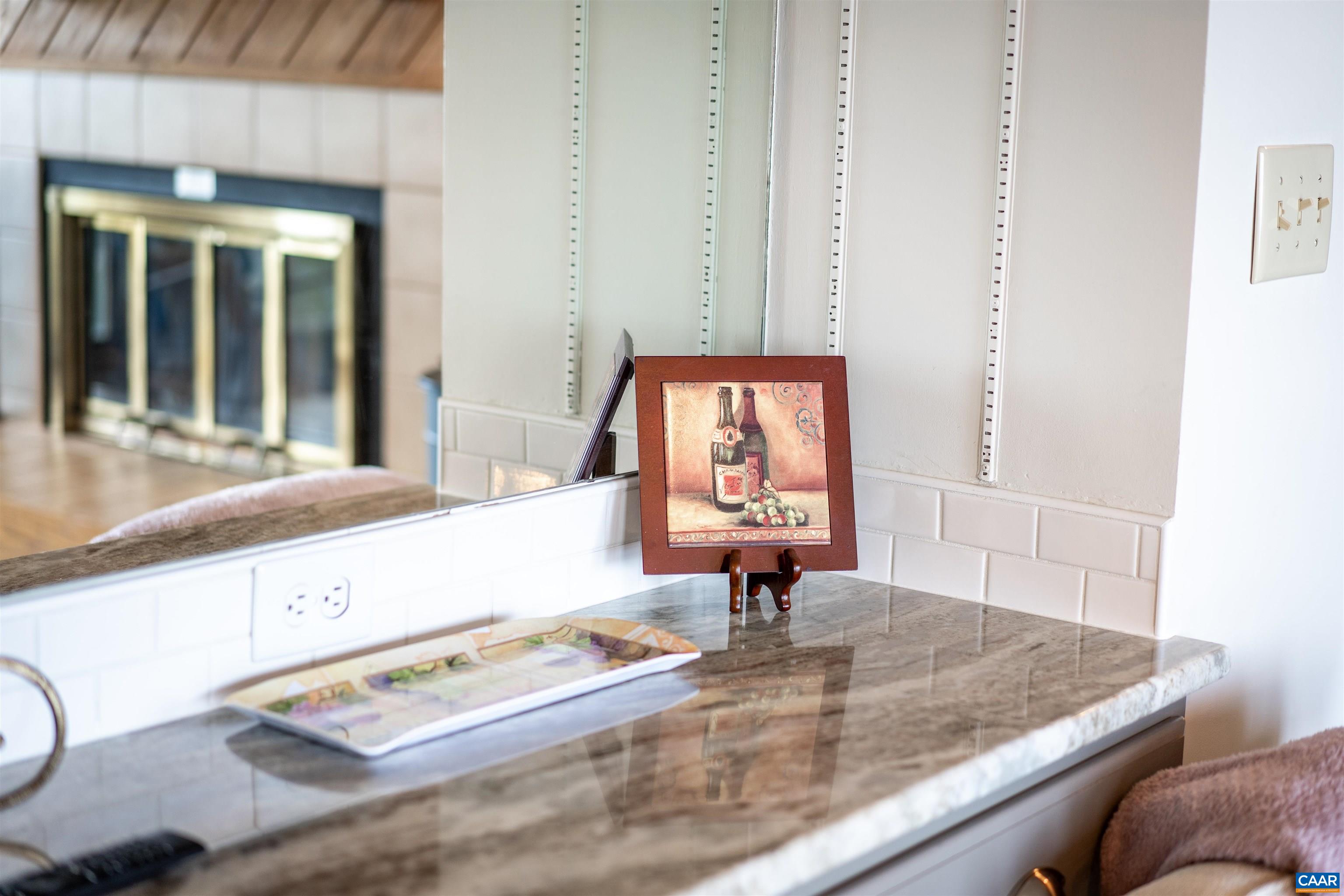 1581 Vistas Roseland, VA 22967 - Photo 15 of 53 a view of kitchen island with granite countertop a sink and a window