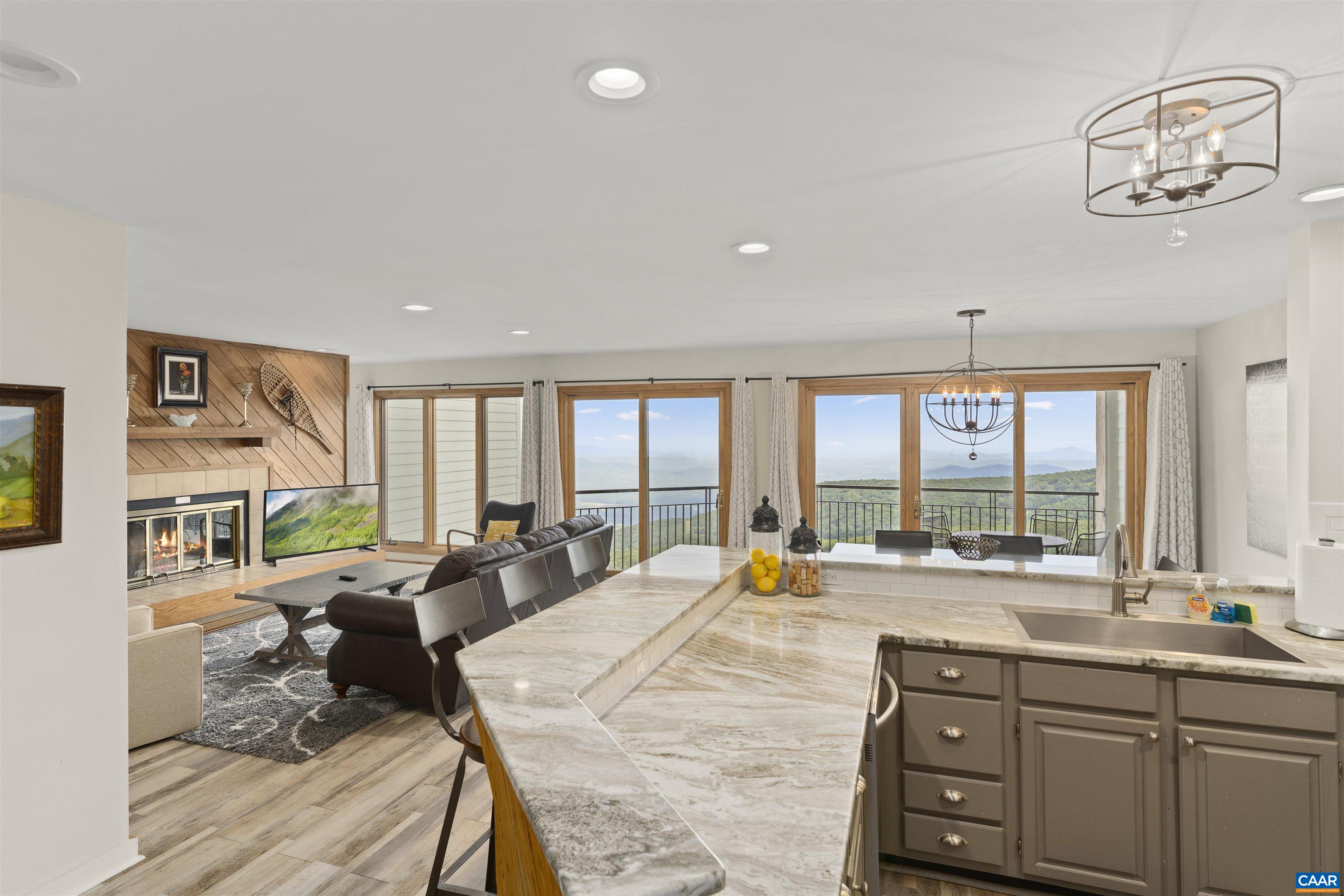 1581 Vistas Roseland, VA 22967 - Photo 20 of 53 a large bedroom with a large bed and large windows