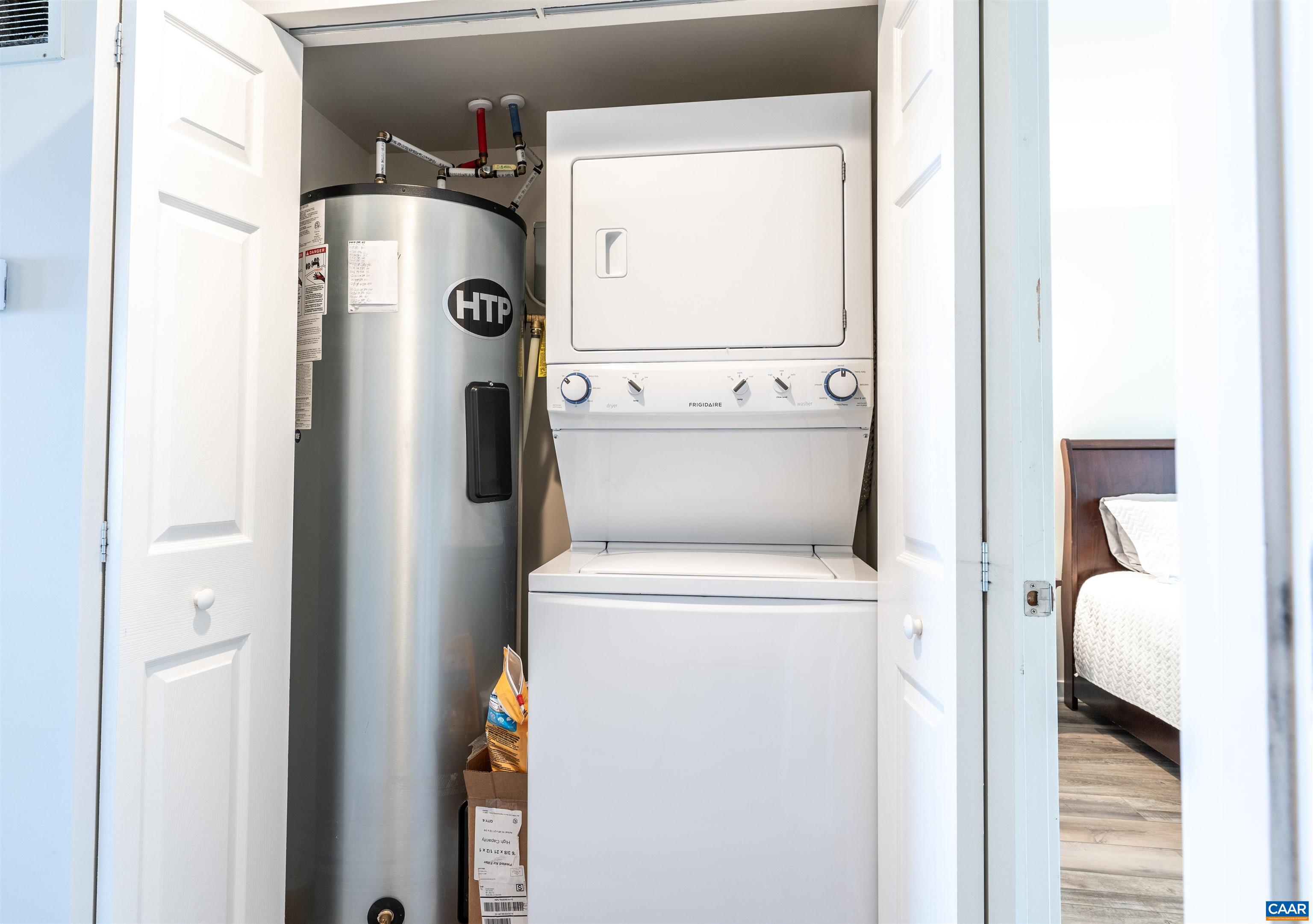1581 Vistas Roseland, VA 22967 - Photo 46 of 53 a utility room with dryer and washer